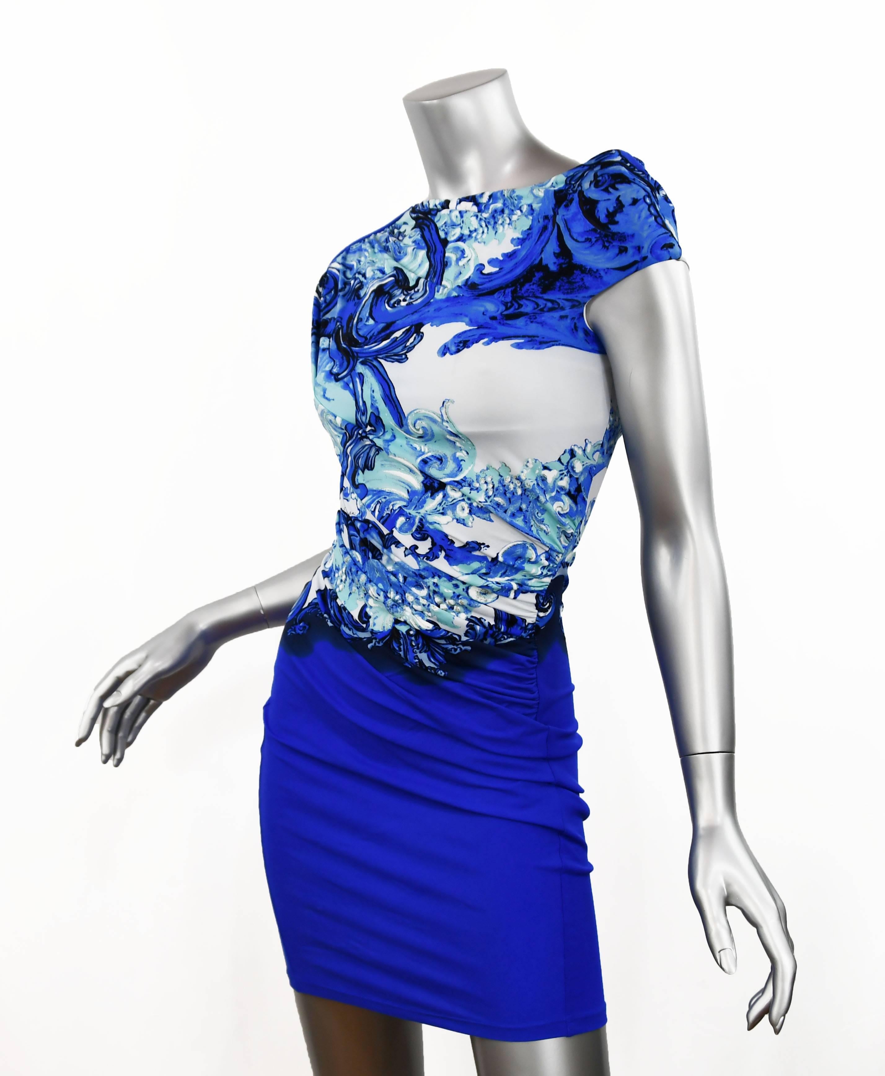 Roberto Cavalli Royal Blue (Bottom) with Mermaid/Sea Print sleeveless top (white/blue/silver/turquoise) in one piece.  Very flattering for the figure.  Easy summer and resort wear.  Size 40 