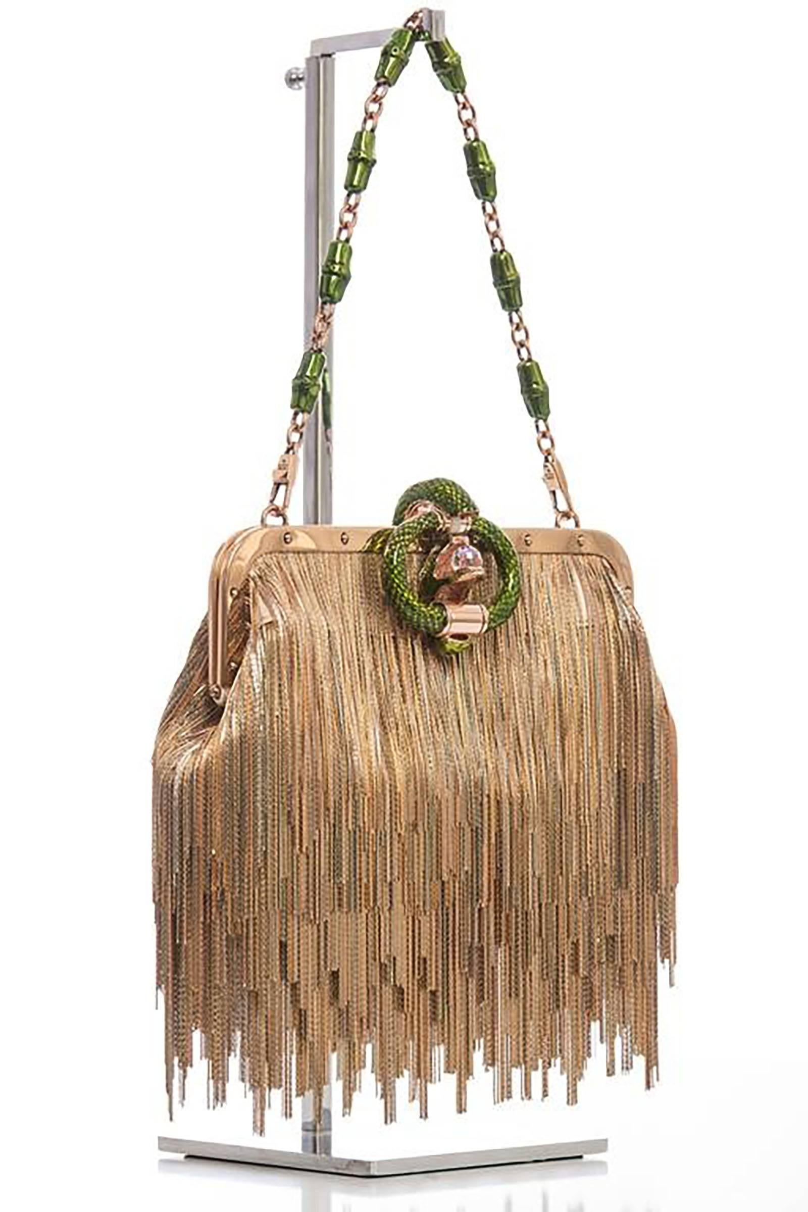 Tom Ford for Gucci, Spring / Summer 2004 Champagne satin, fringe dragon series evening bag with gold-tone hardware, single shoulder strap with bamboo chain-link accent, gold-tone fringe embellishment throughout.  Inside champagne satin lining,