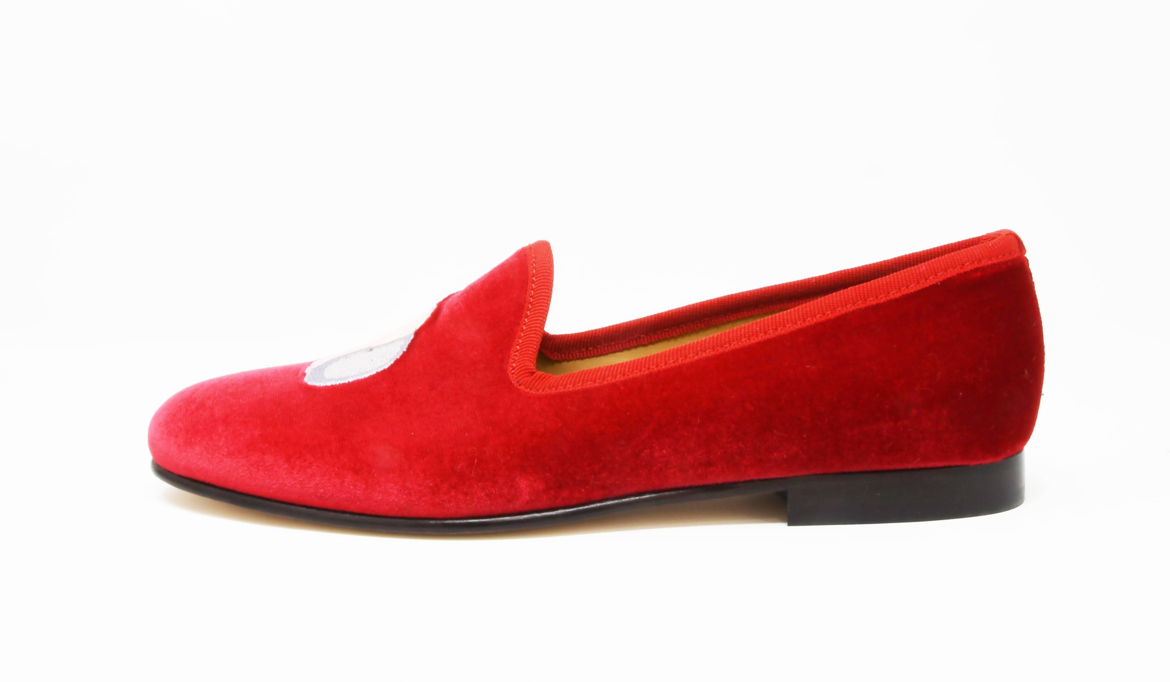 Classic velvet vibrant red Del Toro Bombshell smoking flats feel modern and playful detailed with bomb and seashell embroidery.  Spice up your wardrobe and get noticed in these shoes.  Size 7