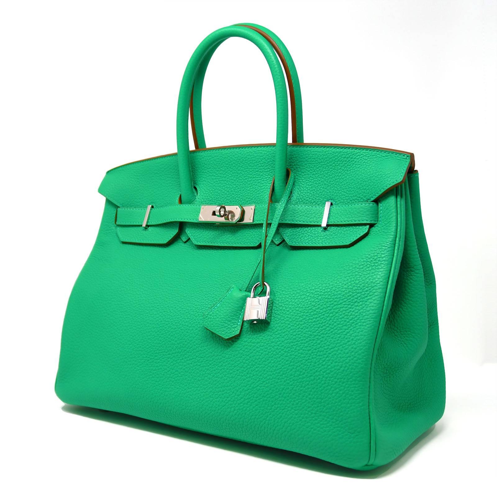 Brand new green menthe Birkin bag with plastic on the hardware. Fun and vibrant color for summer. Extremely rare color. Not made anymore. Bag comes with dust bag, raincoat, signature Hermes box, and clochette. 