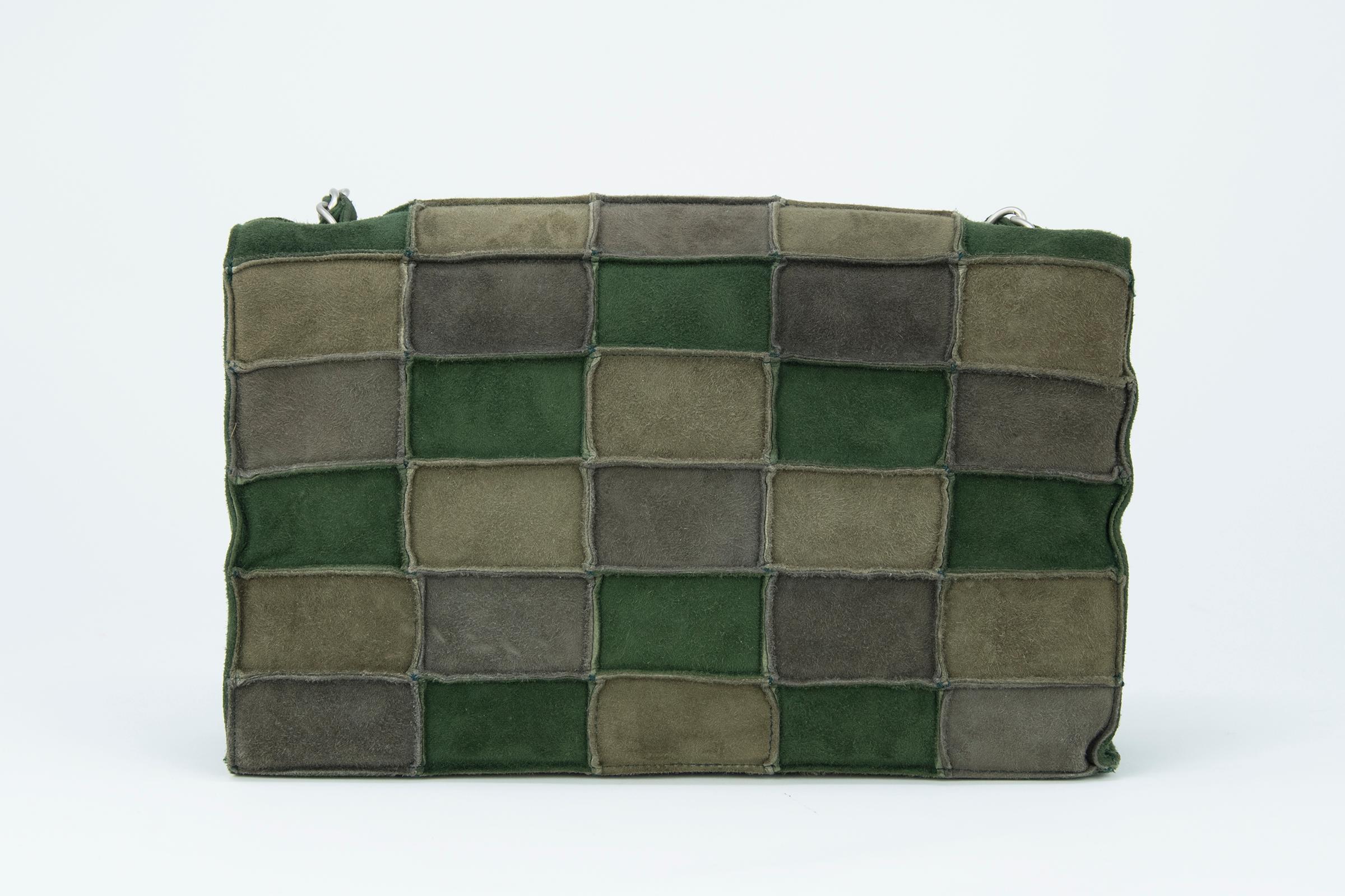 Incredible and unique Chanel medium double flap bag made of green patched suede.  An incredible color palette for fall.  Features silver hardware and a long chain strap.

Condition: New

Dimensions (Approximate): 9.5