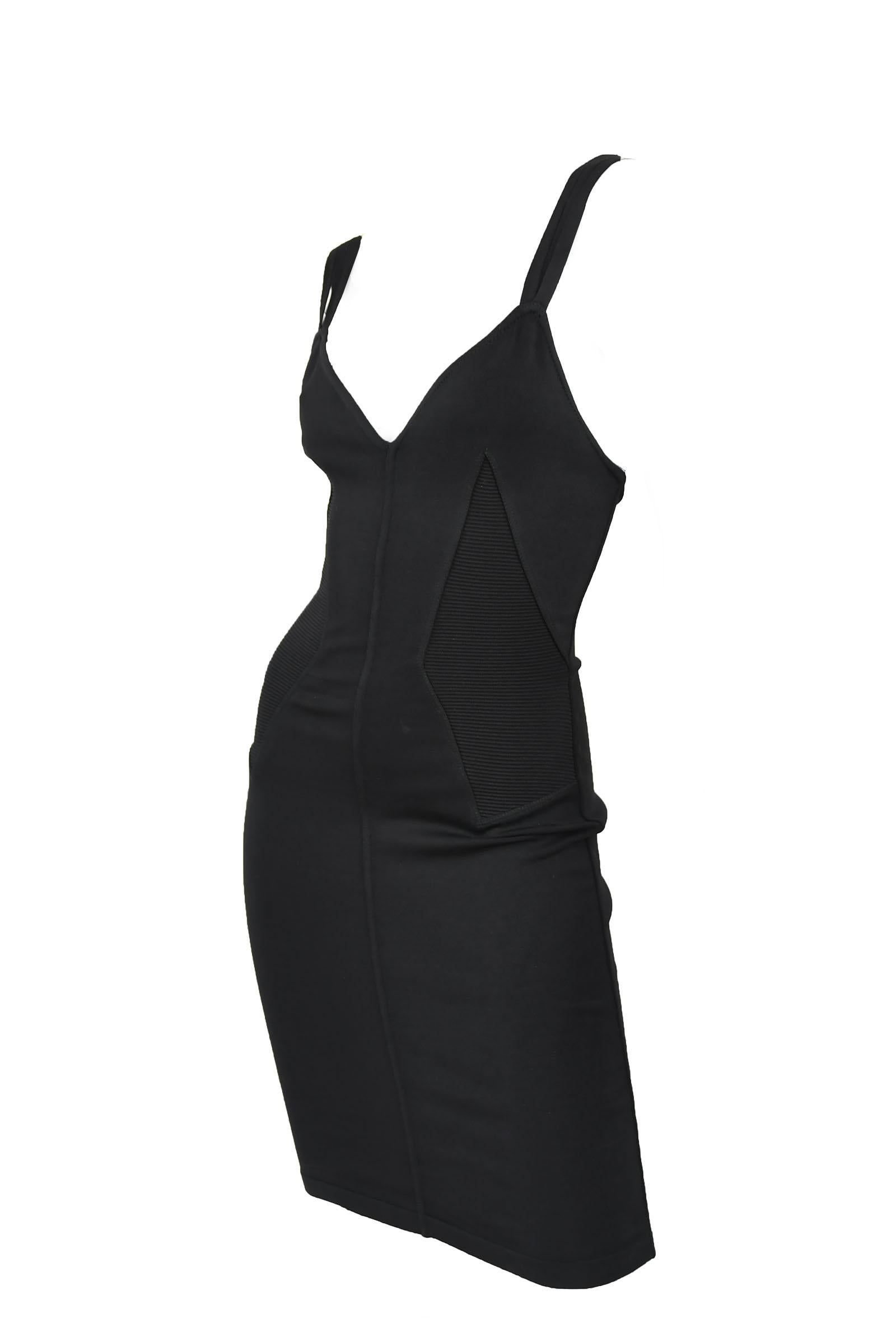 Sexy, strappy black Alaia vintage dress with gorgeous ribbed detail through the bodice.  This is a rare find from the 1980's.  Perfect outfit for date night.  

Size: S

Condition: Pristine vintage condition

Composition: 85% rayon, 15%