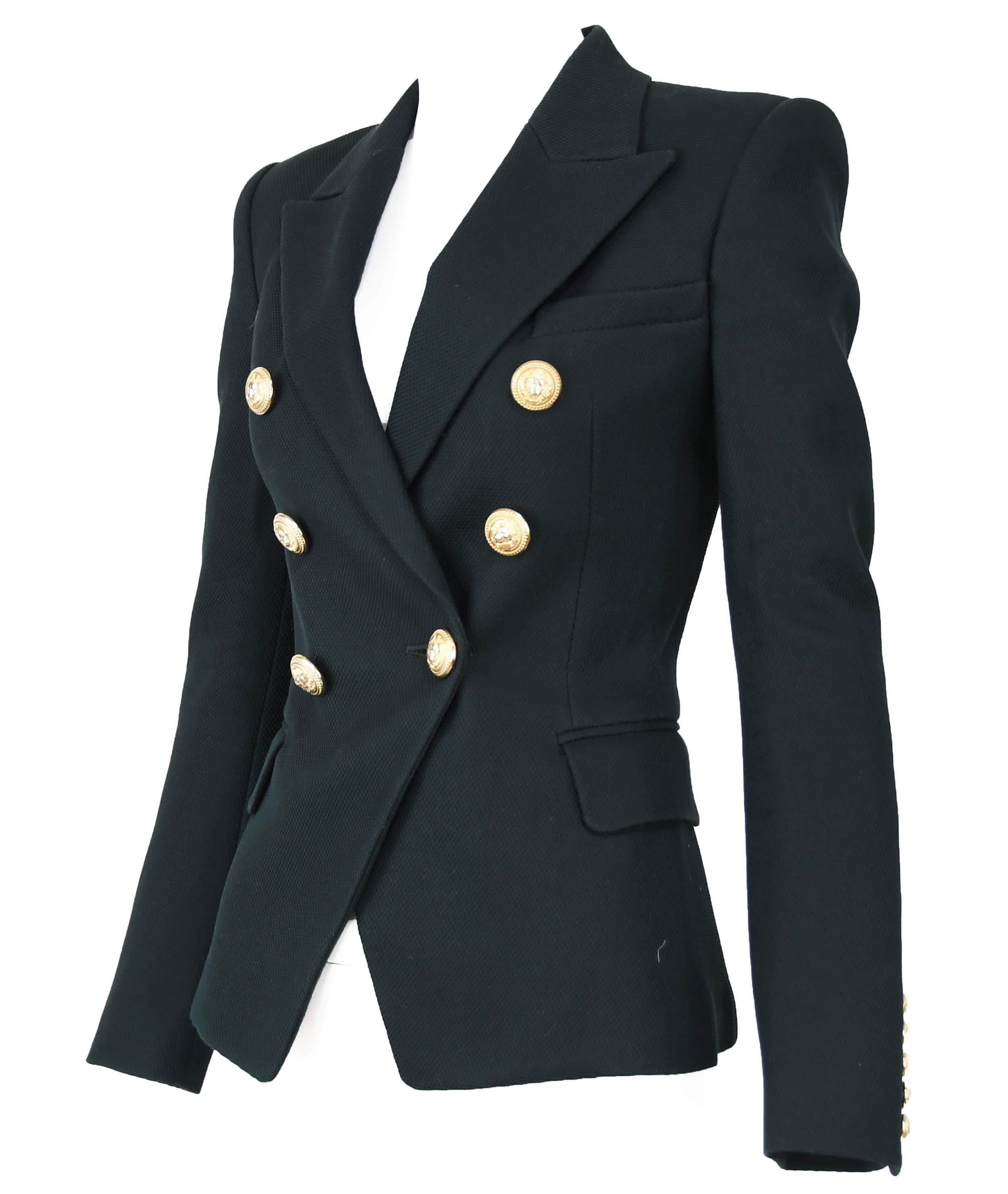 Balmain black pique double breasted blazer with gold Indian buttons.  

Size: FR 34

Condition: Brand new with original tags

Composition: 100% cotton / (lining) 52% viscose, 48% cotton

Care: Dry clean only

Made in Slovaqia