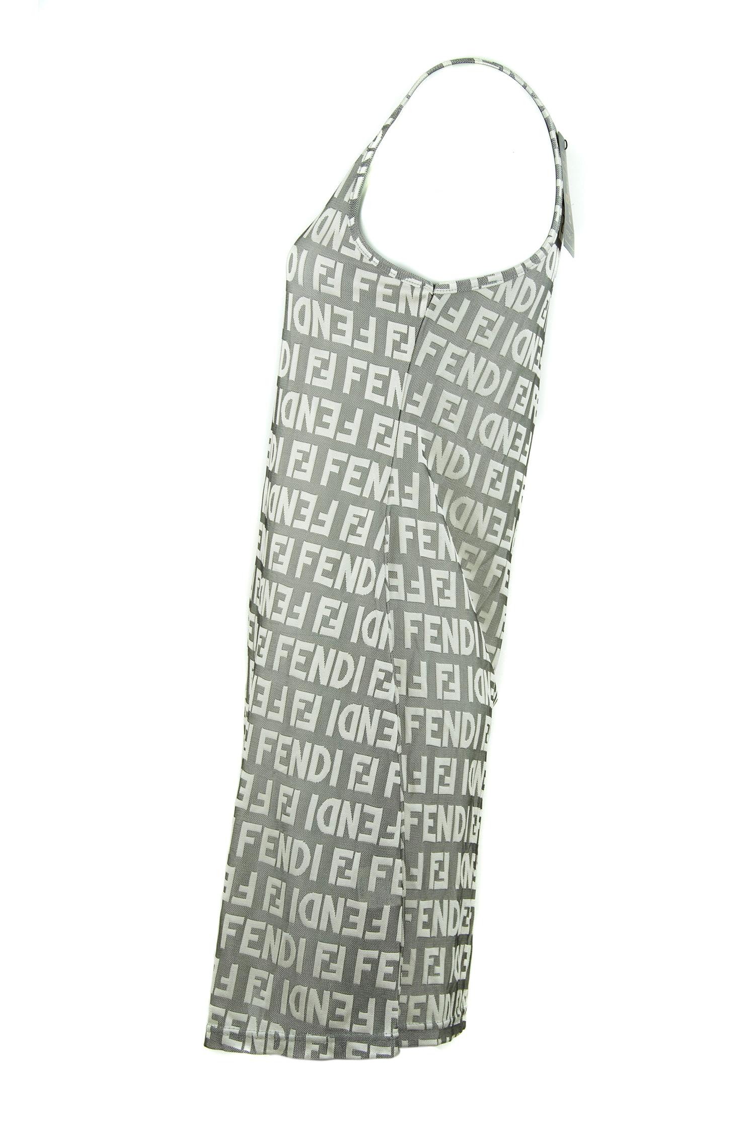 Fendi lovers look no further, this gray and off white Fendi logo dress is the perfect addition to your wardrobe.  The perfect weight for spring summer, this is an easy loose spaghetti strap dress to throw on with a light jacket.  New with