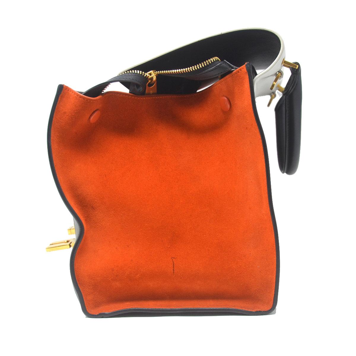Company-Celine
Model-Trapeze Medium 
Color-Tri Color White Black and Orange 
Date Code-S-AT-4184 S-CU-5104
Material-Leather and Suede 
Measurements-11.75