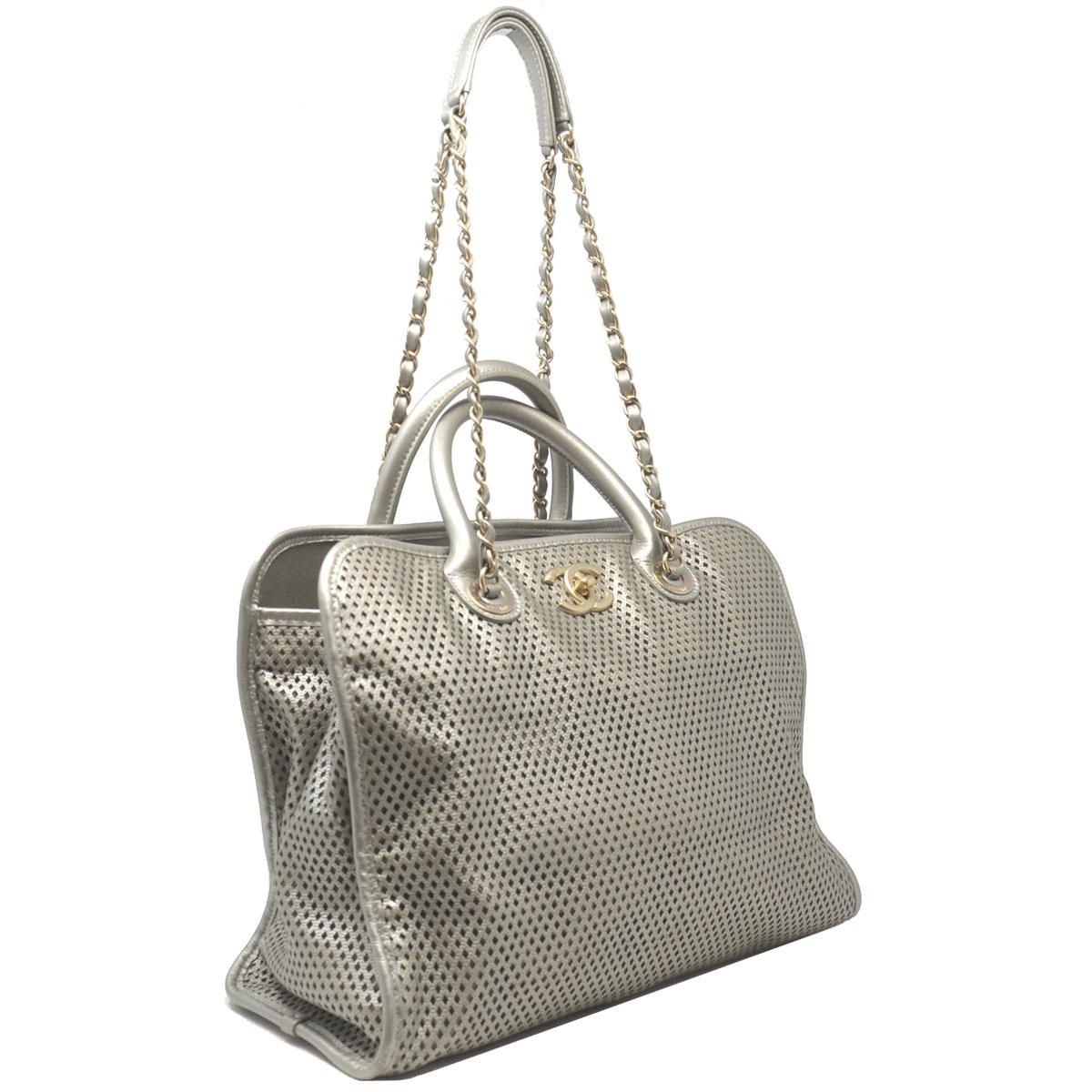 Company-Chanel
Model-Gray Metallic GHW Perforated Leather Tote Handbag 
Color-Gray Metallic 
Date Code-17490649
Material-Leather
Measurements-13