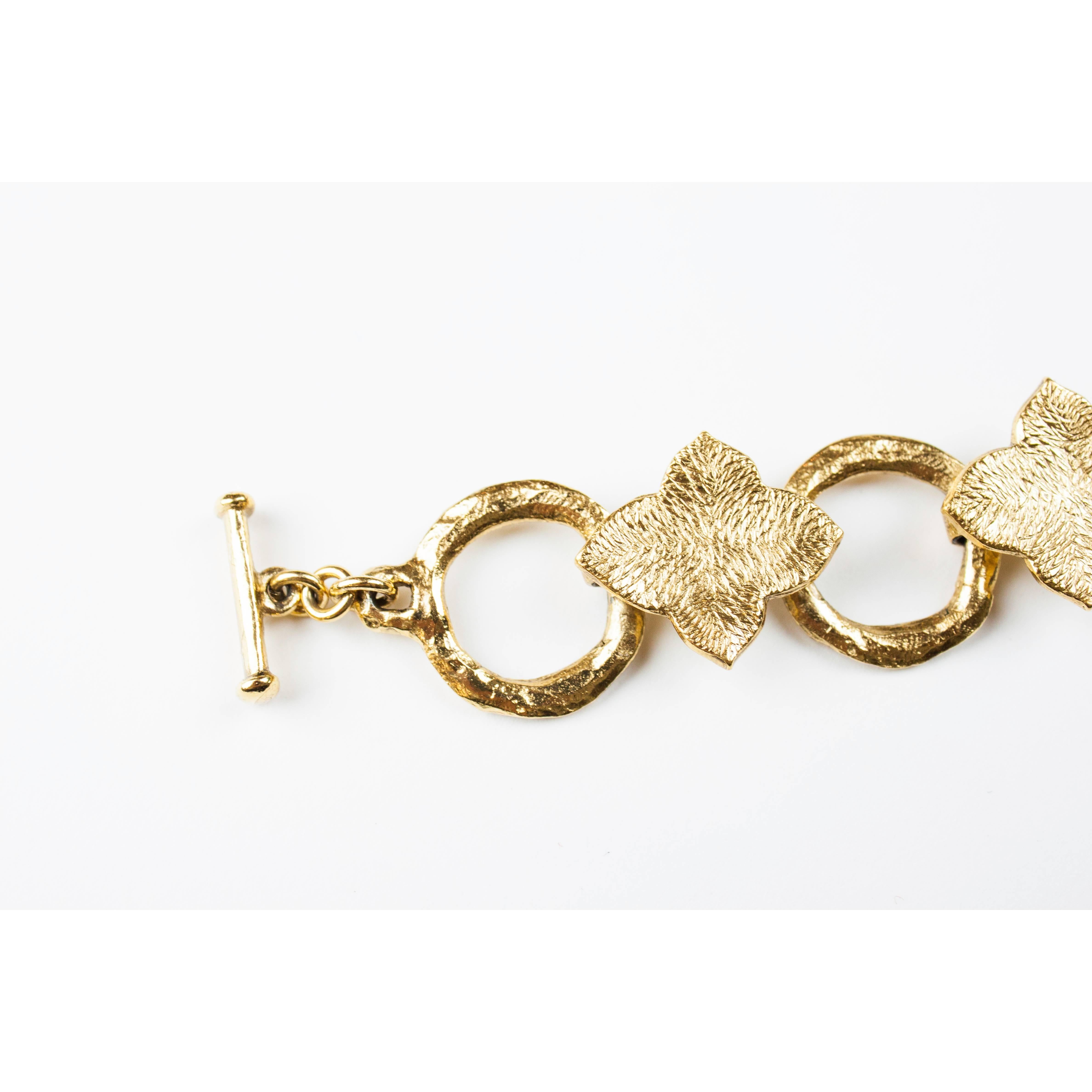 Yves Saint Laurent  lucky charm gold tone chain link belt. Circa 1970   1
