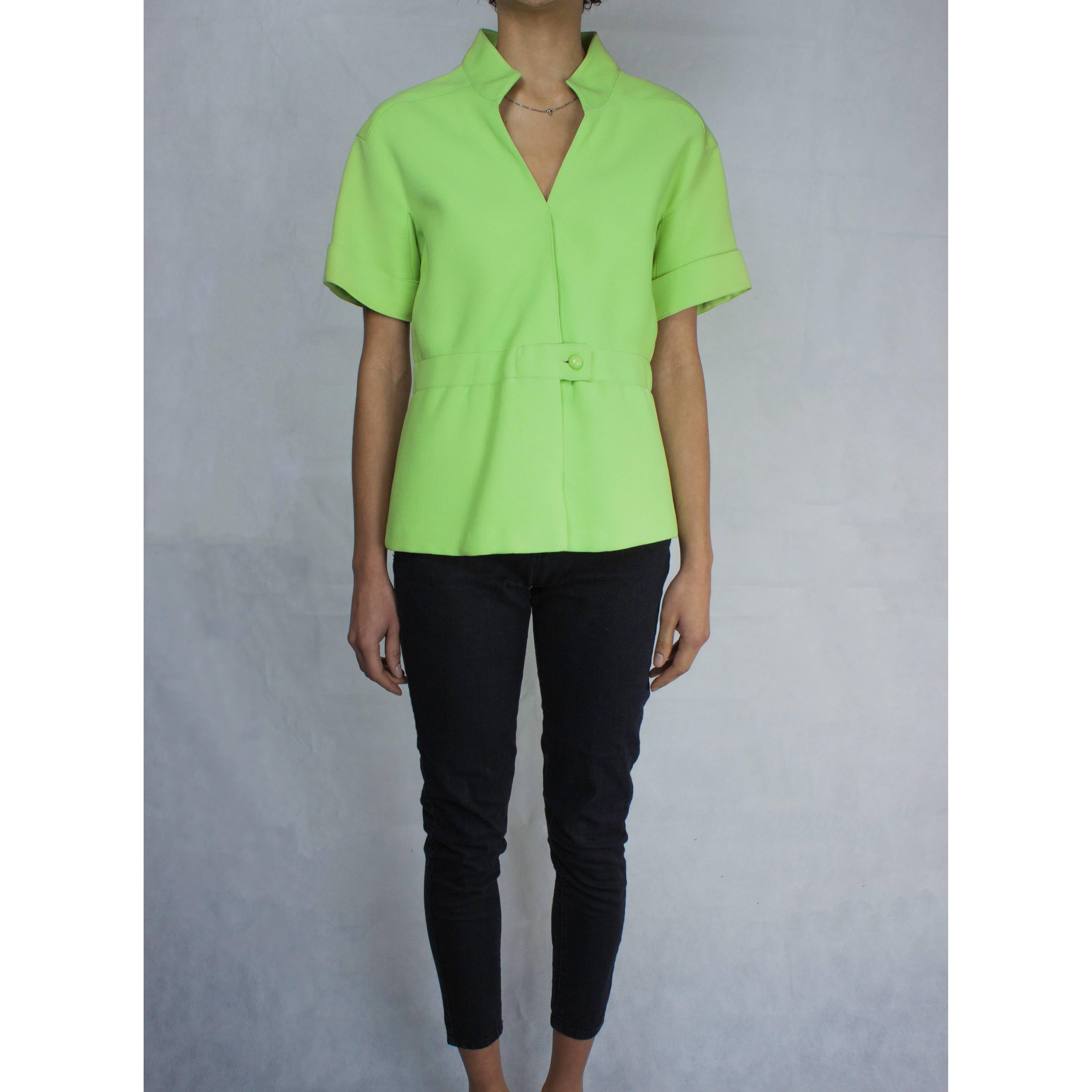 

Andrè Courreges wanted to create clothing that was suitable for the changing times. In this sense he was a true modernist designer.

This iconic Future Couture lime green tunic has a certain style and attitude that reject old norms and embrace a