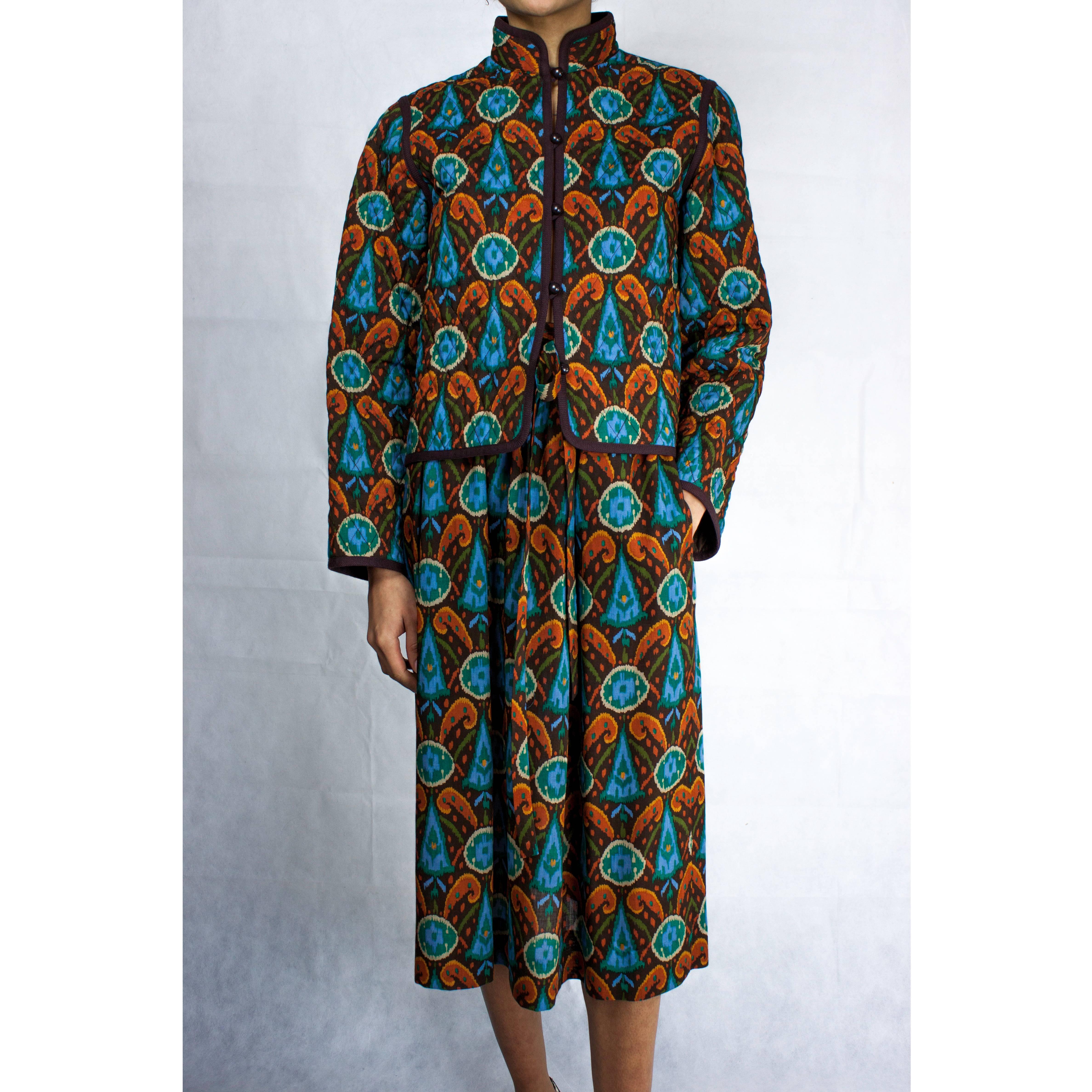 Yves Saint Laurent's 1976 Russian Collection revolutionised the course of fashion around the world.

This 1976 skirt and jacket ensemble perfectly reflects Saint Laurent's interest in folk cultures.  For example, the motifs of the print evoke the