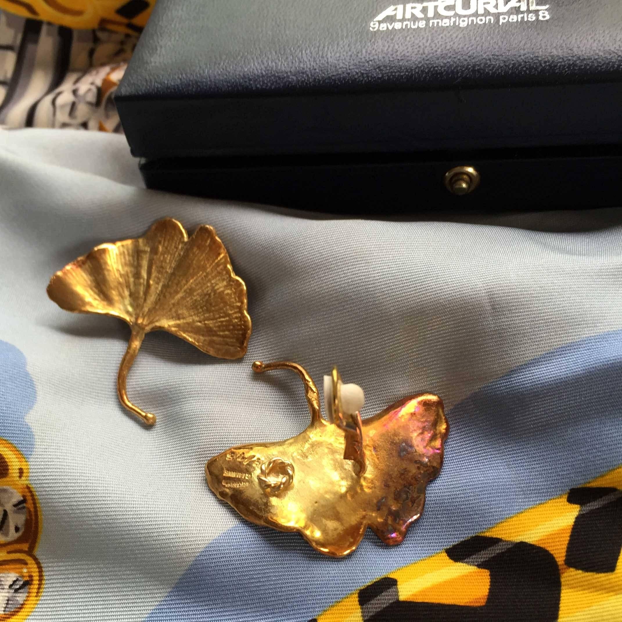 *Important Jewelry*

CLAUDE LALANNE GINGKO EARRINGS IN ARTCURIAL BOX
Circa: 1980
Place of Origin: France
Artist: CLAUDE LALANNE (French, 1924 - )
HANDMADE
From the artist's OWN PERSONAL COLLECTION. 
Numbered 9/75 
Material: metal
Condition: