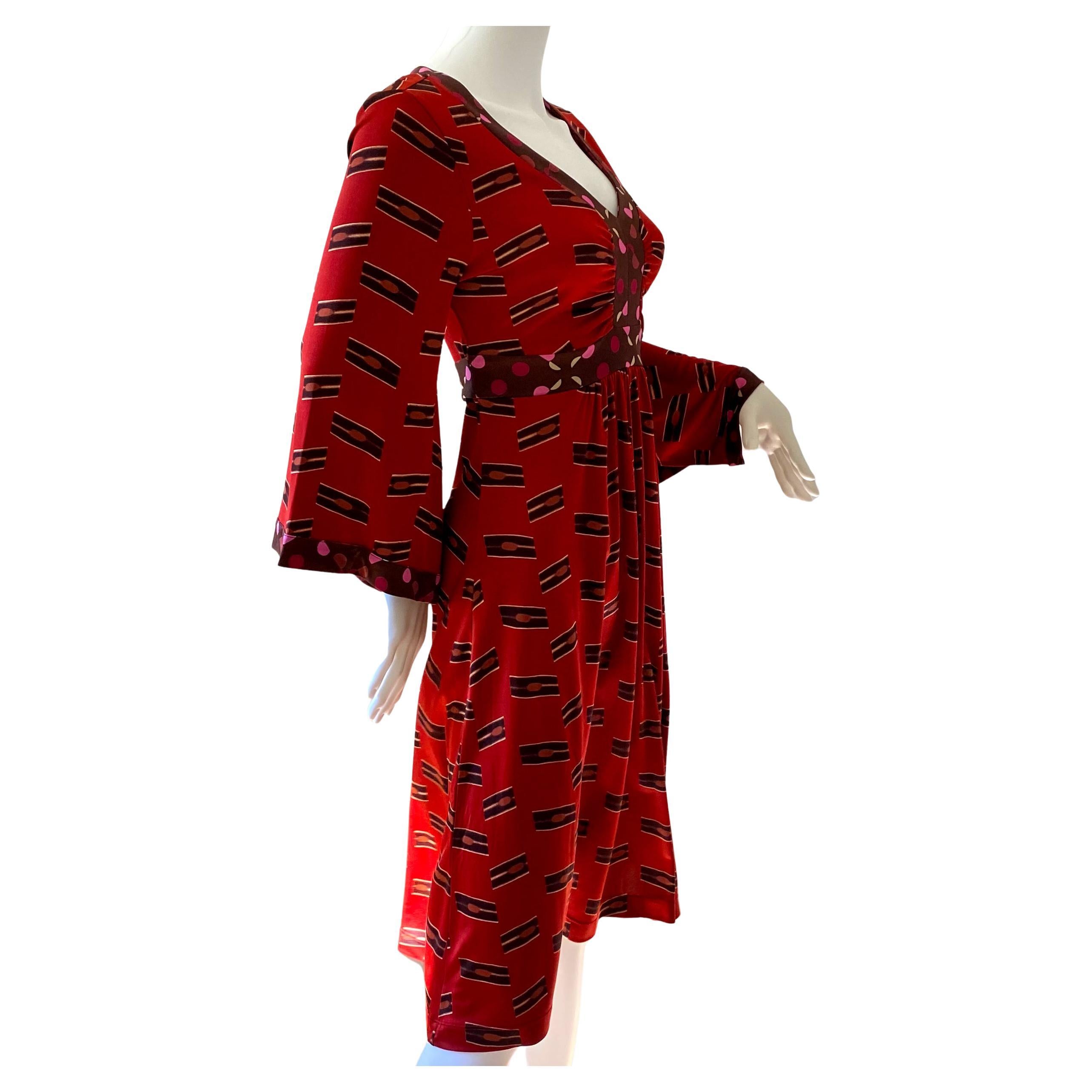 Deep rich red color with original Japanese woodblock print.
Split kimono sleeves.
Mixed dot print tie ties at back.
Lots of volume in skirt.
Authentic FLORA KUNG silk dresses are made in premiere quality, long-filament silk yarn which gives a