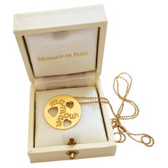 Collier pendentif Maman Amour en or 18 carats, musée français de la Monnaie 