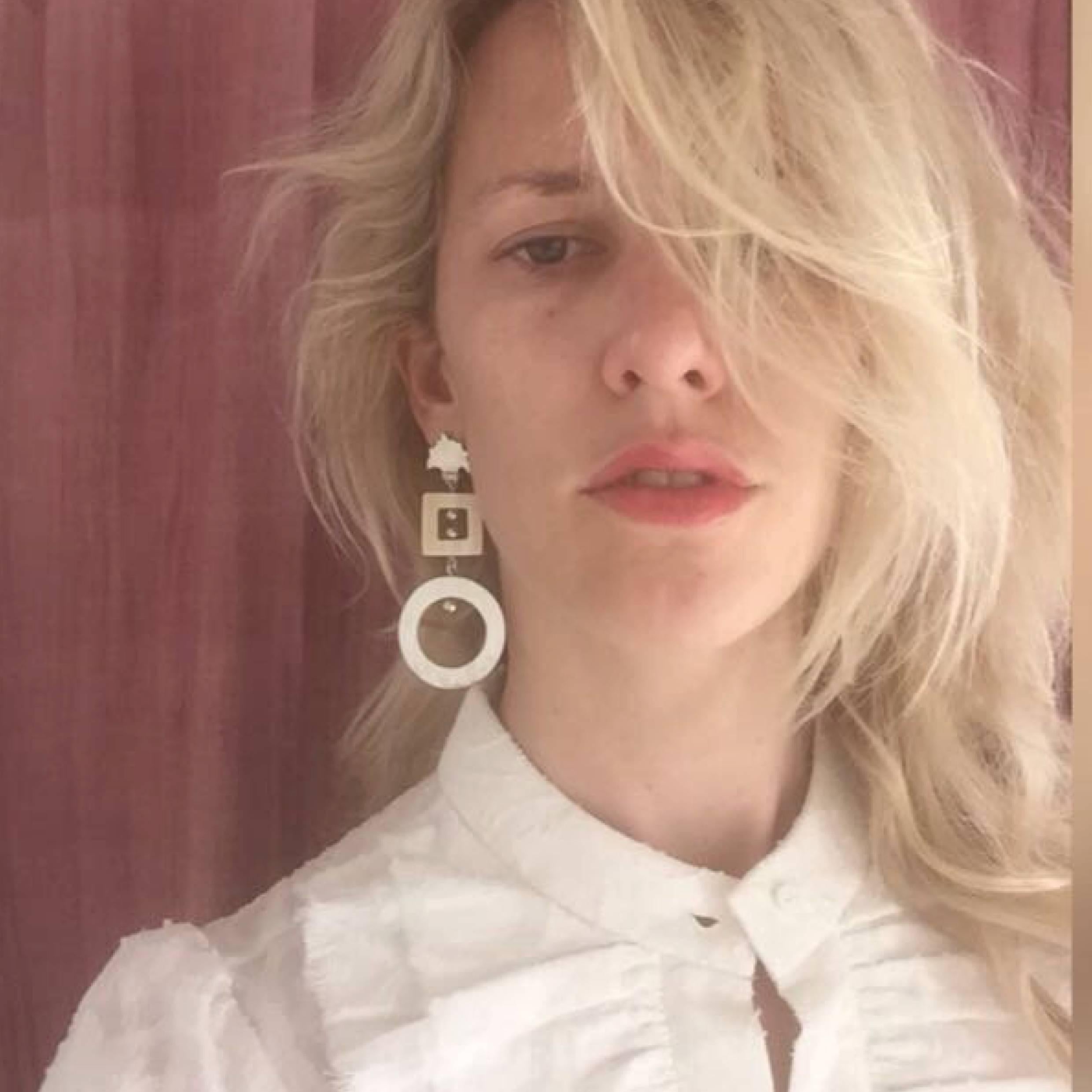 These unique earrings are hand crafted from African cow horn and finished by hand in London.

Earrings are handmade from natural materials with sterling silver pin-backs. 

Please note that natural horn graining and colour irregularities may occur.