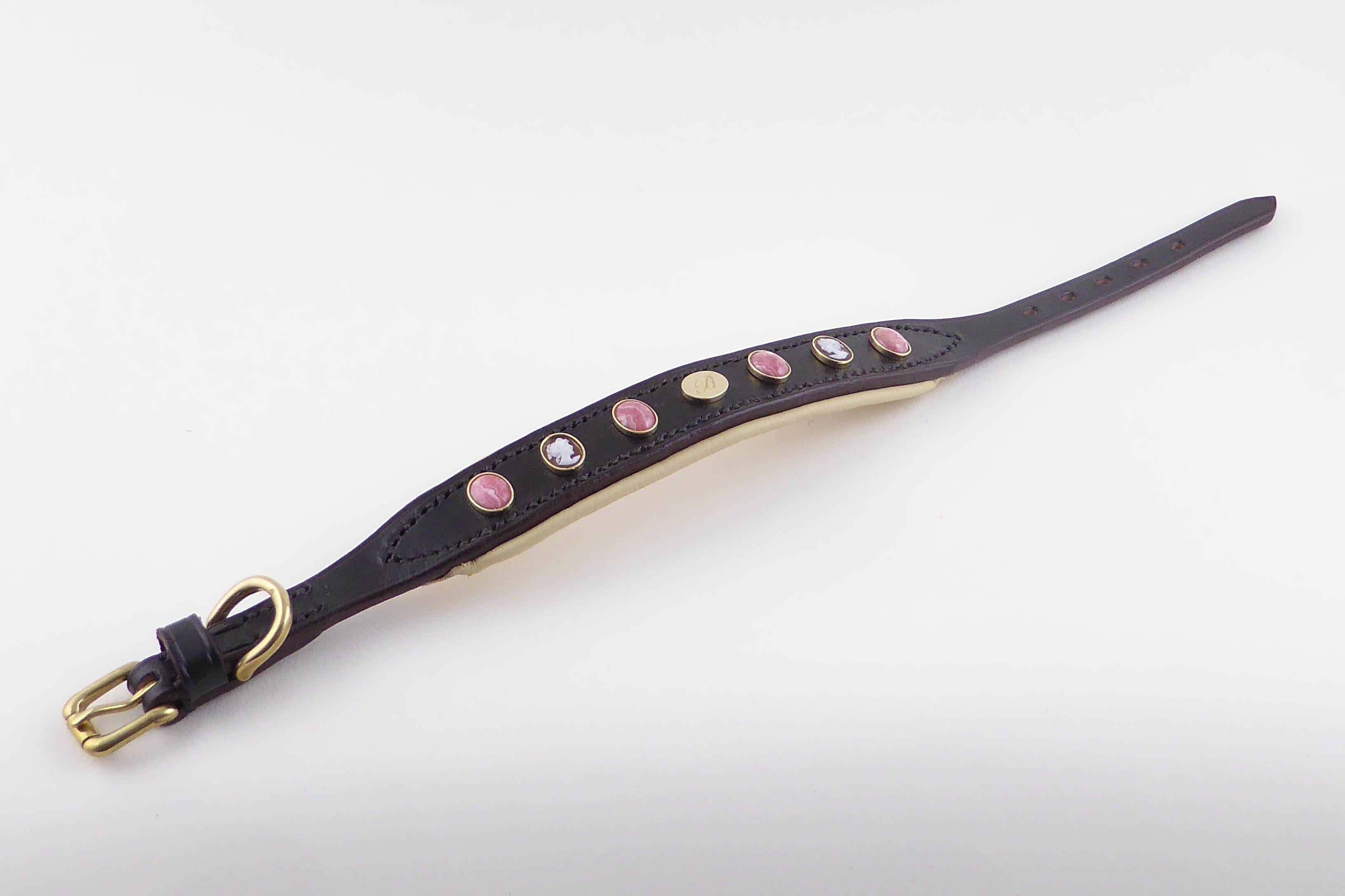 Dog collar custom-made with antique shell cameos and rhodochrosite stones with 100% havana leather and soft leather padding inside.

This is a bespoke piece and can be customised; available to ship within 3-4 weeks. 

Made by hand in England.