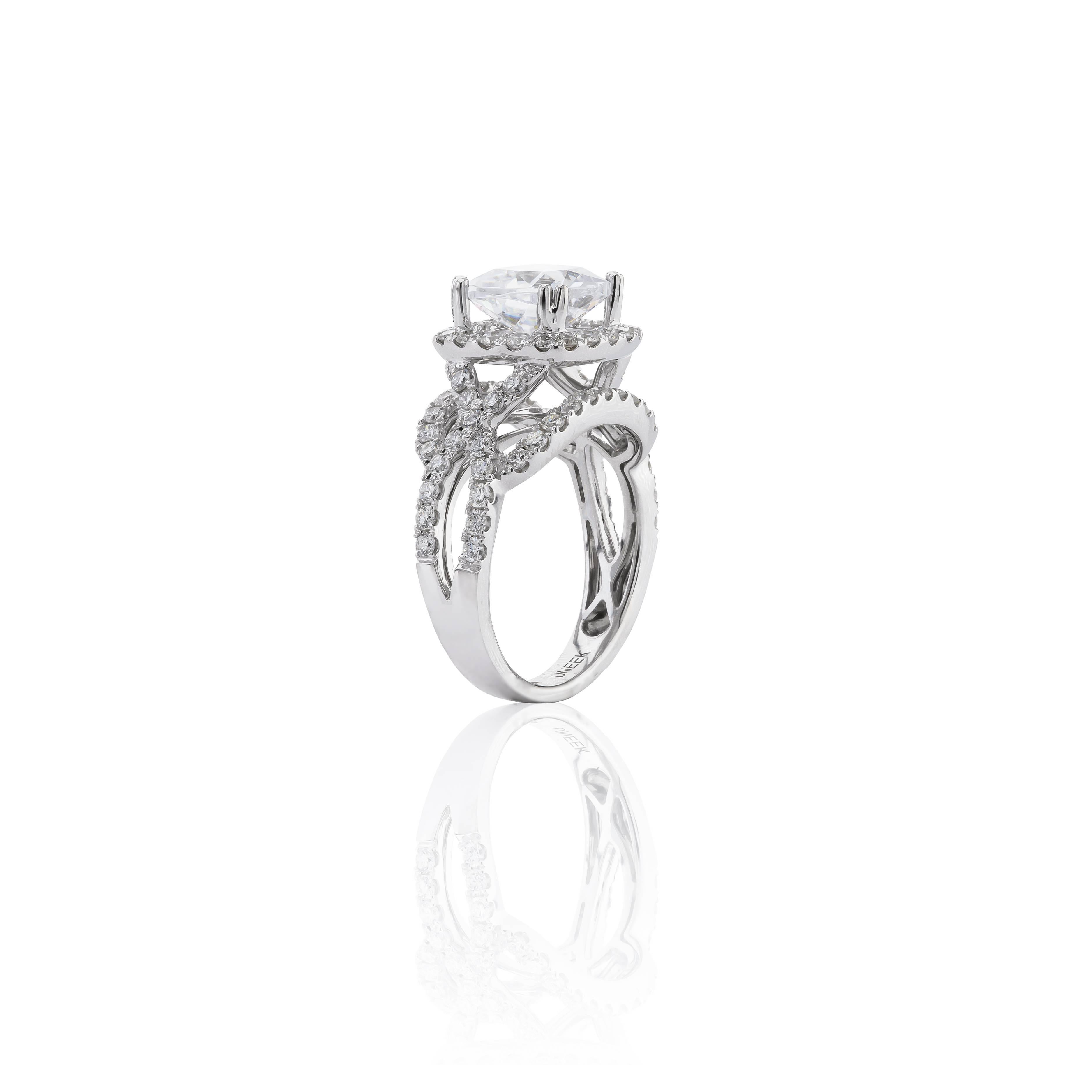 14K White Gold Semi-Mount Ring with 1.40ctw Diamonds.  Center fits 8.5mmx8.5mm.  Center Stone is CZ.  Made by Award Winning Designer Benjamin Javahari at Uneek Designs.  Ring can be sized to fit. 
Currently sized 6.5.  