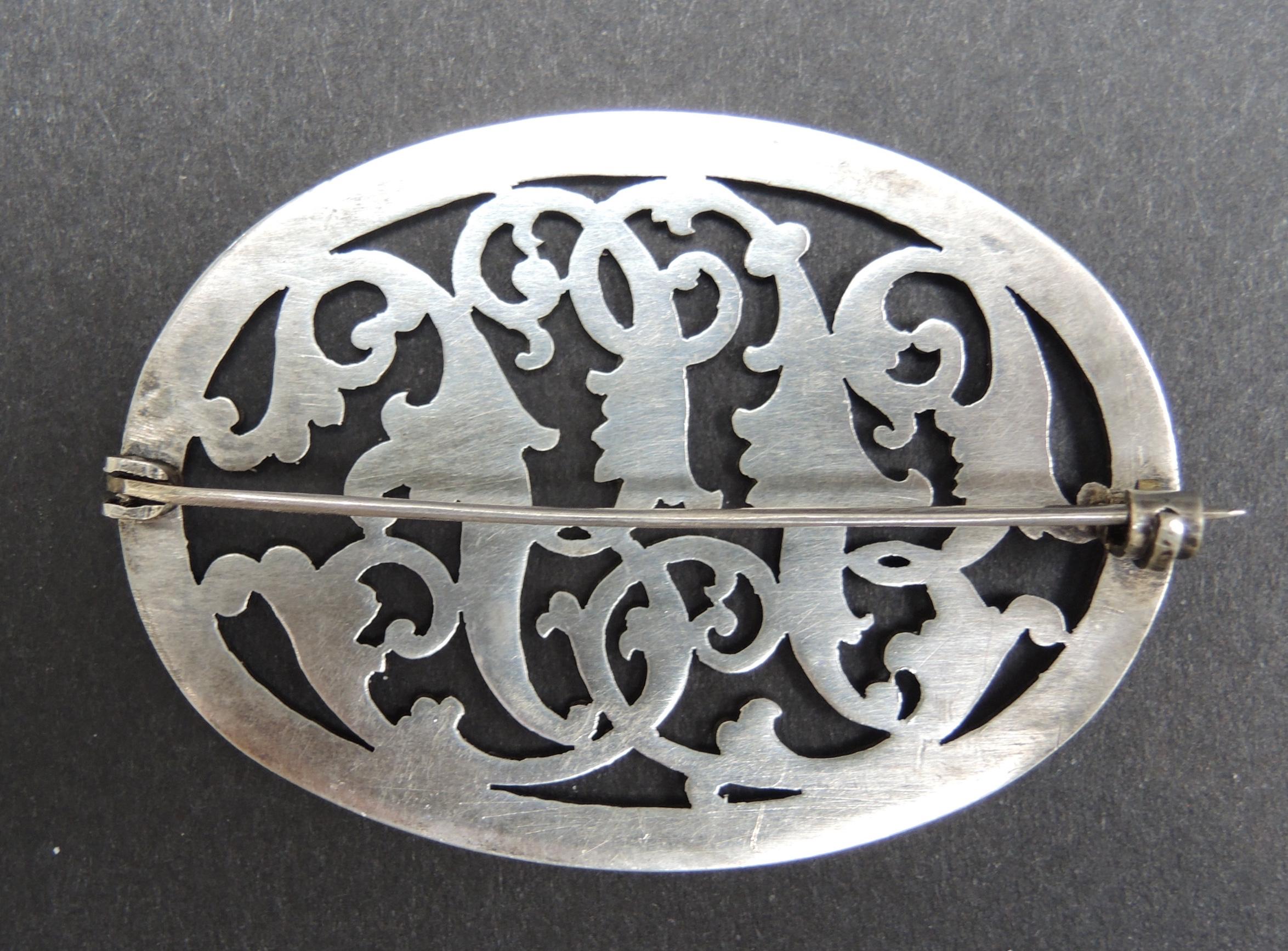 Circa 1900 hand cut and engraved coin silver 825 (unmarked) monogram pin/brooch 
4.25 cm high ( 1.67 