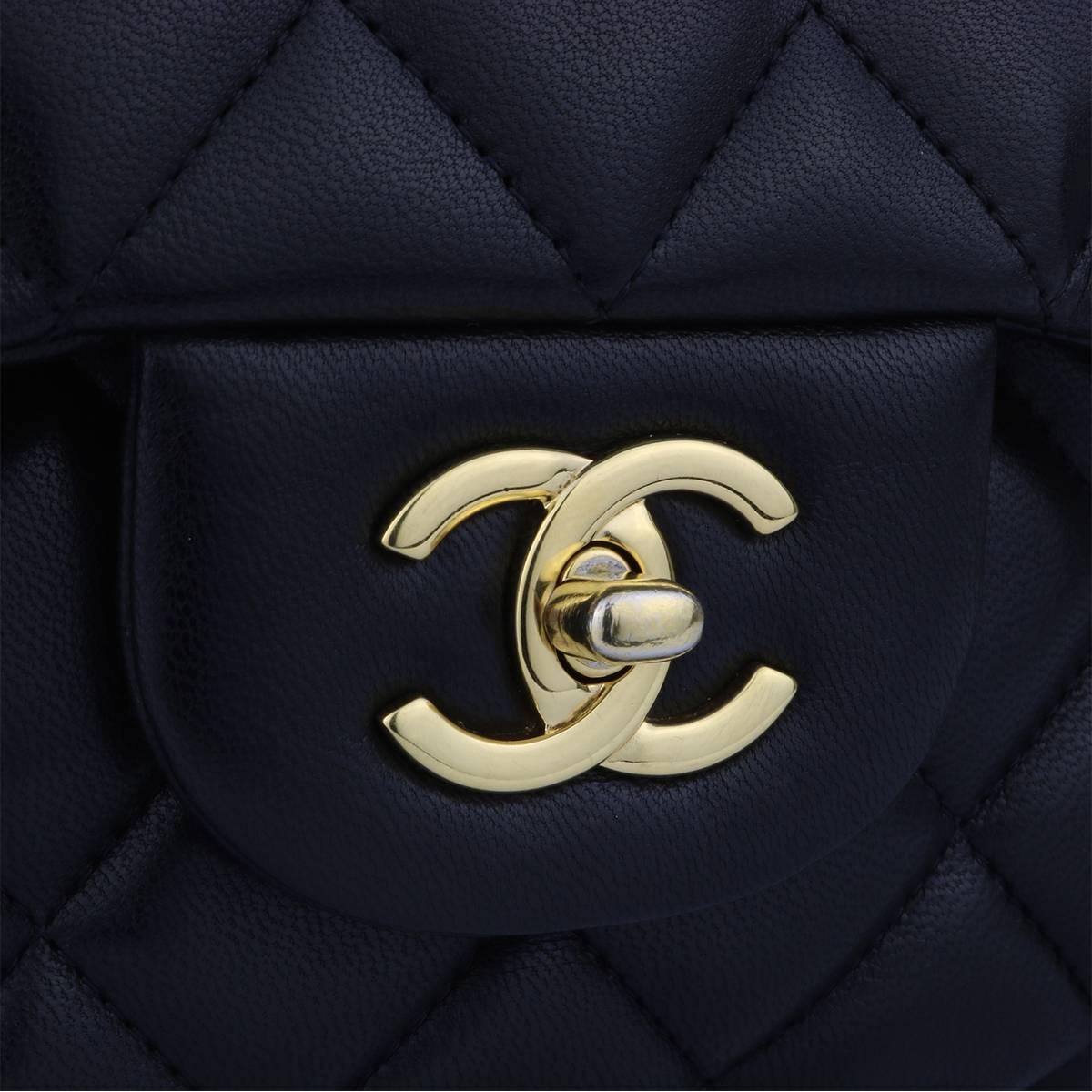 Authentic CHANEL Classic Jumbo Double Flap Black Lambskin with Gold Hardware 2013.

This stunning bag is in an excellent condition, the bag still holds its shape very well, and the hardware is still very shiny.

Exterior Condition: Great condition,