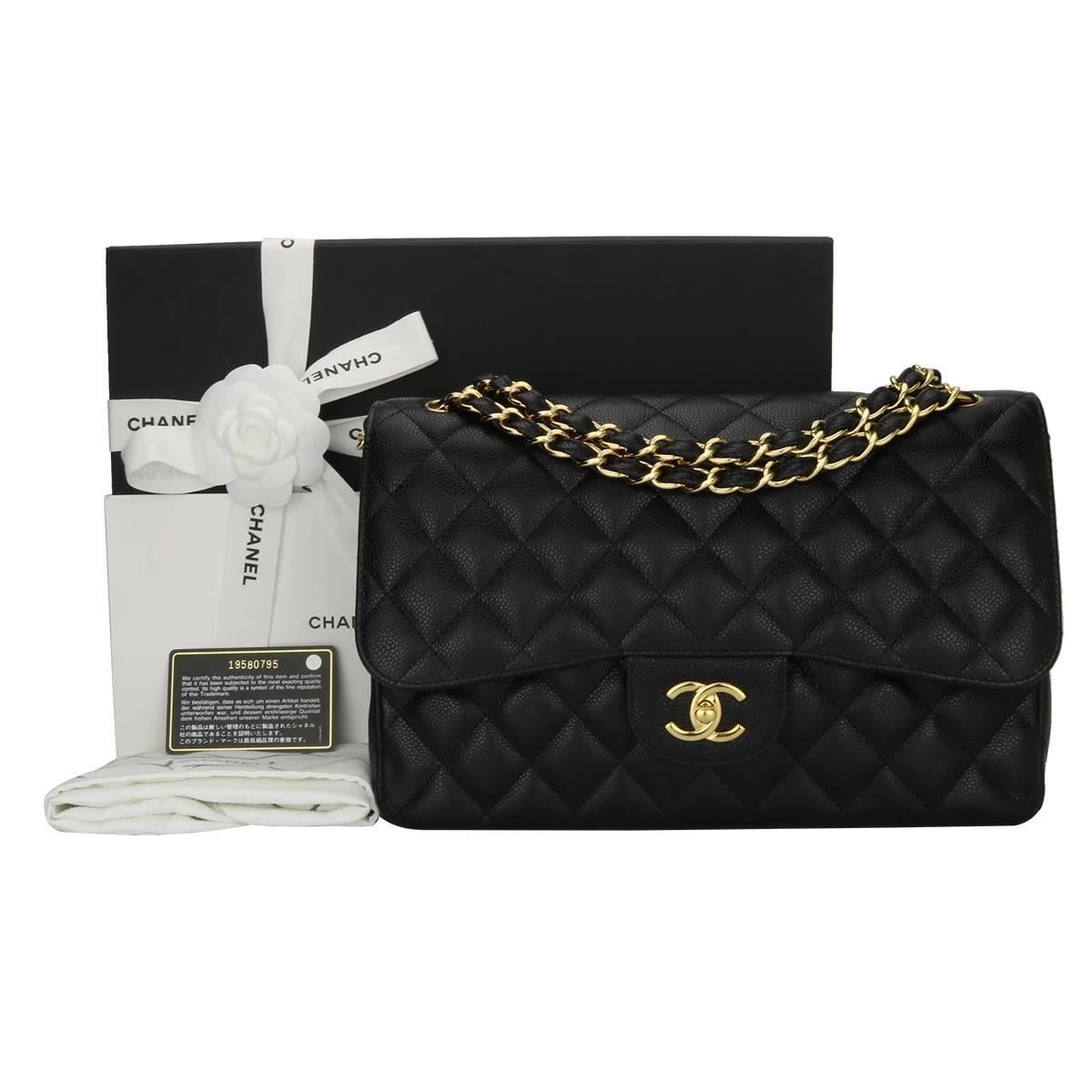 Authentic CHANEL Classic Jumbo Double Flap Black Caviar with Gold Hardware 2014.

This stunning bag is in a pristine condition, the bag still holds its original shape, and the hardware is still very shiny. Leather smells fresh as if new.

Exterior