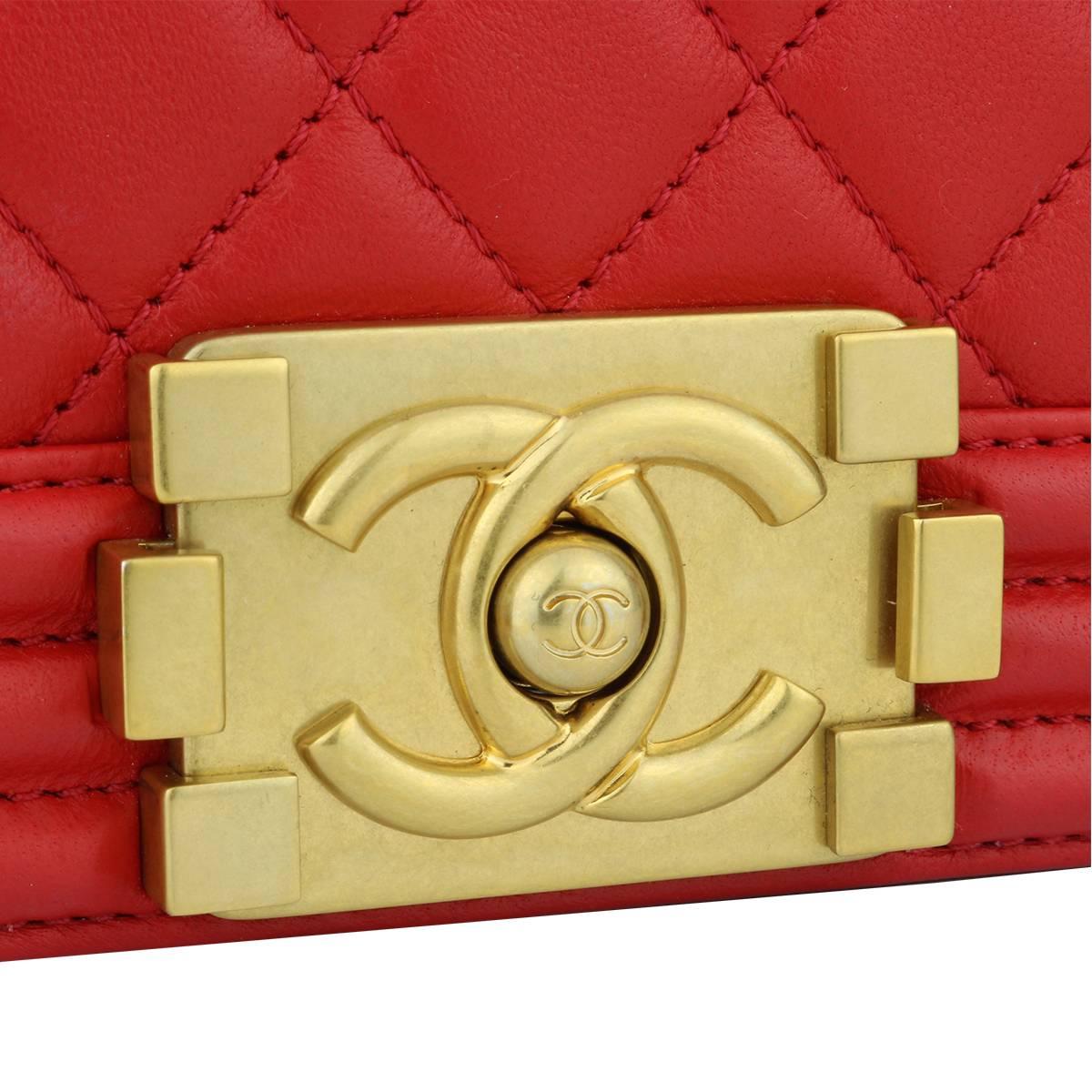Authentic CHANEL Old Medium Quilted Boy Red Lambskin with Brushed Gold Hardware 2017.

This stunning bag is still in a mint condition, the bag still holds its original shape and the hardware is still very clean and shiny.

Exterior Condition: Mint