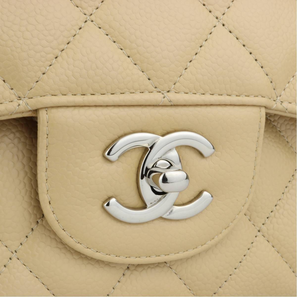 Authentic CHANEL Classic Double Flap Jumbo Beige Clair Caviar with Silver Hardware 2013.

This stunning bag is in mint condition, the bag still holds the original shape and the hardware is still very shiny.

Exterior Condition: Mint condition, tiny
