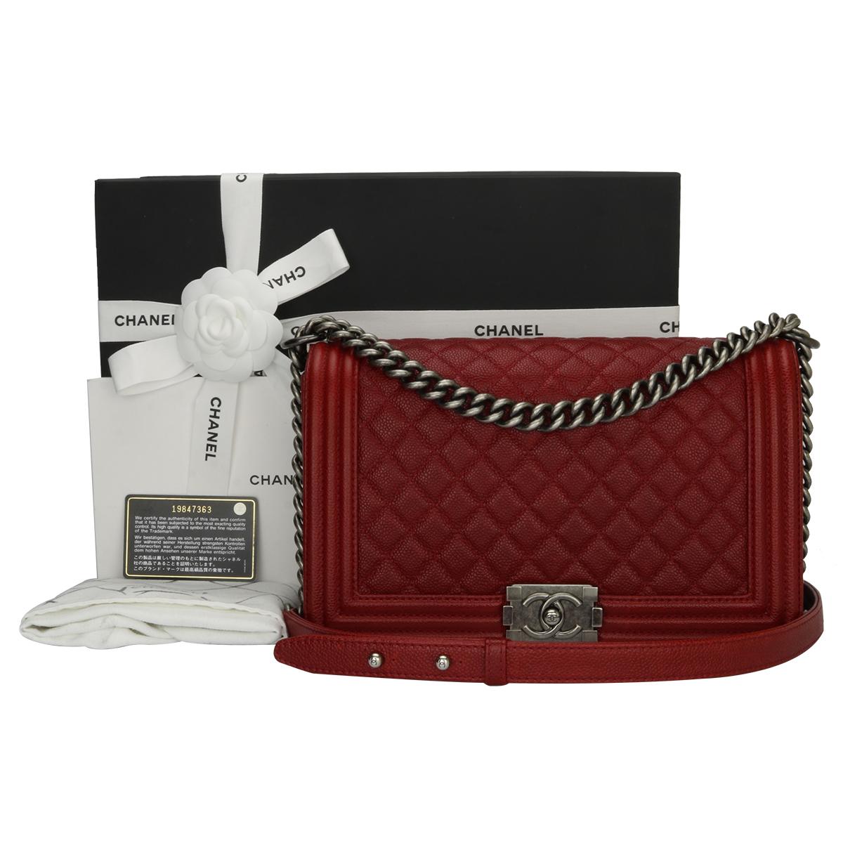 Authentic CHANEL New Medium Quilted Boy Rich Red Caviar with Ruthenium Hardware 2015.

This stunning bag is still in a mint condition; it still keeps its original shape well and the hardware still very shiny, leather smells fresh as if