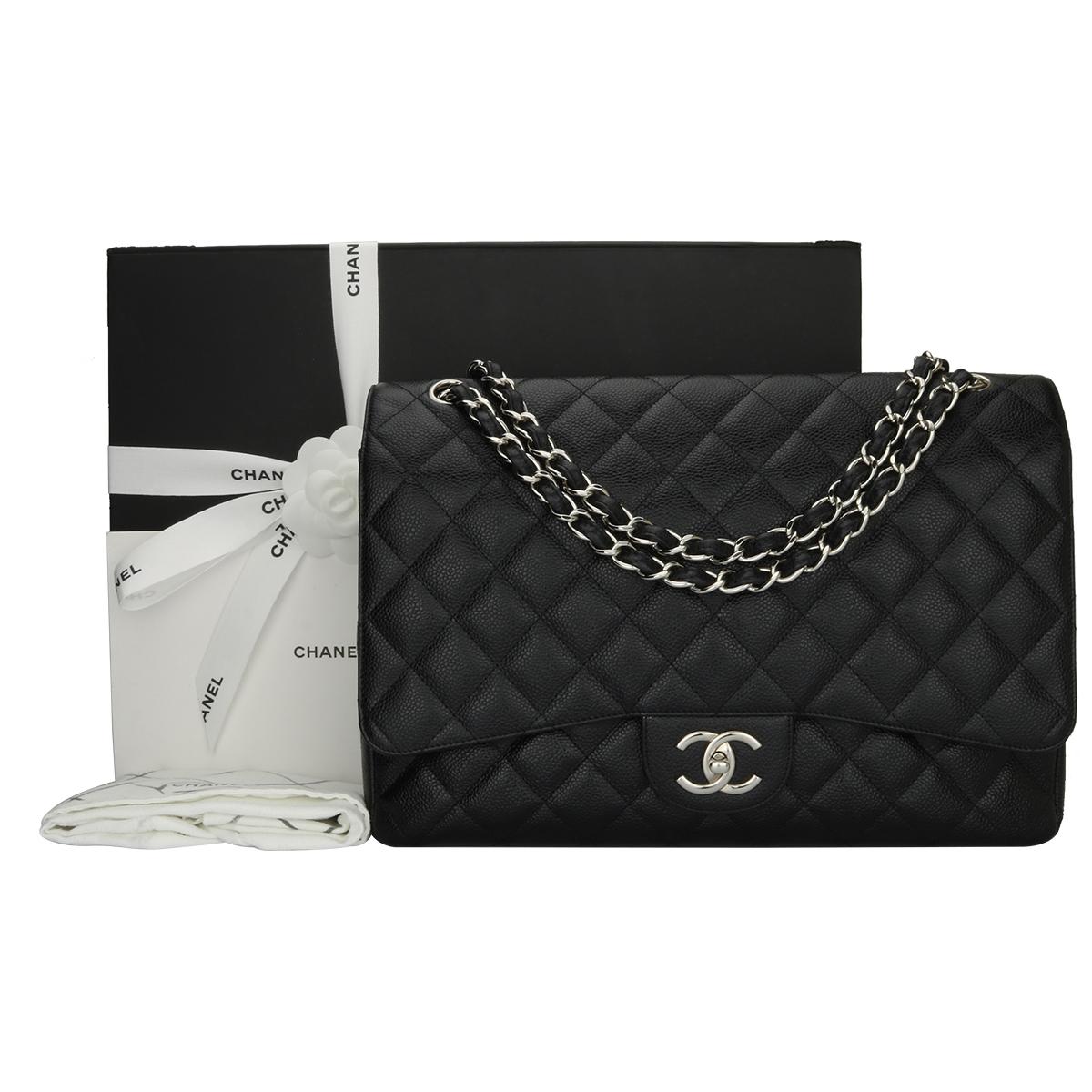 Authentic CHANEL Black Caviar Maxi Double Flap with Silver Hardware 2012.

This stunning bag is in a mint condition, the bag still holds its original shape and the hardware is still very shiny. Leather still smells fresh as if new.

Exterior