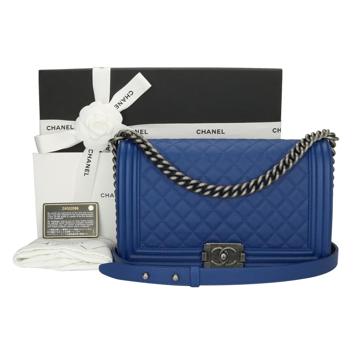 Authentic CHANEL New Medium Quilted Boy Blue Caviar with Ruthenium Hardware 2018.

This stunning bag is still in a mint condition; it still keeps its original shape well and the hardware still very shiny, leather smells fresh as if new.

Exterior