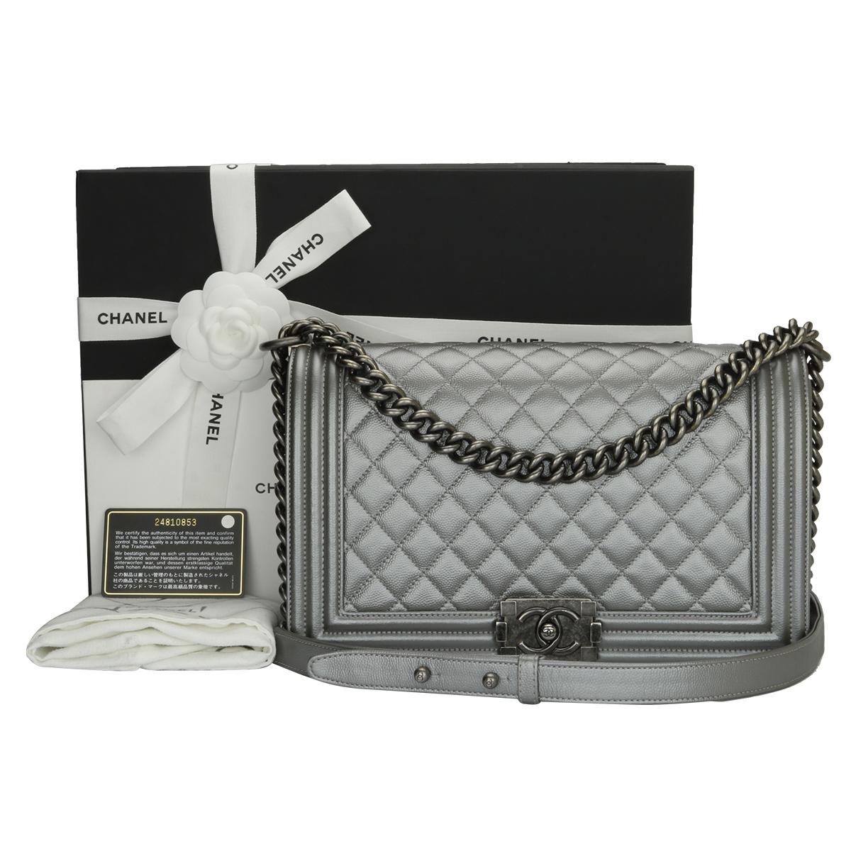 Authentic CHANEL New Medium Quilted Boy Silver Grey Caviar with Ruthenium Hardware 2018.

This stunning bag is still in a mint condition; it still keeps its original shape and the hardware still very shiny, leather smells fresh as if new.

Exterior