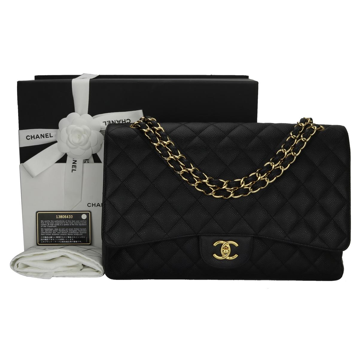 Authentic CHANEL Black Caviar Maxi Single Flap with Gold Hardware 2009.

This stunning bag is in a mint condition, the bag still holds its original shape and the hardware is still very shiny. Leather still smells fresh as if new.

Exterior