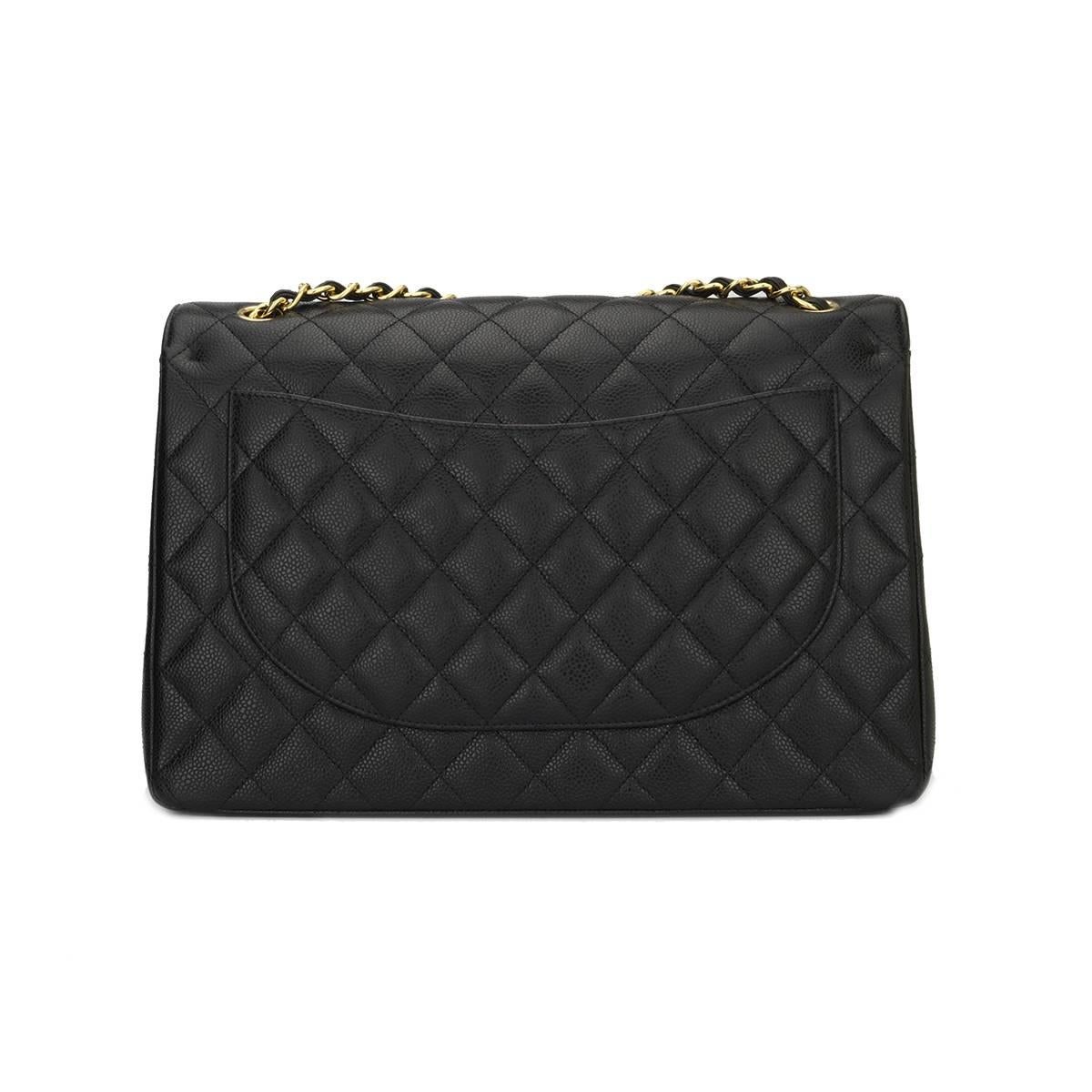 Authentic CHANEL Black Caviar Maxi Double Flap with Gold Hardware 2016.

This stunning bag is in a mint condition, the bag still holds its shape quite well and the hardware is still very shiny. Leather still smells fresh as if new.

Exterior