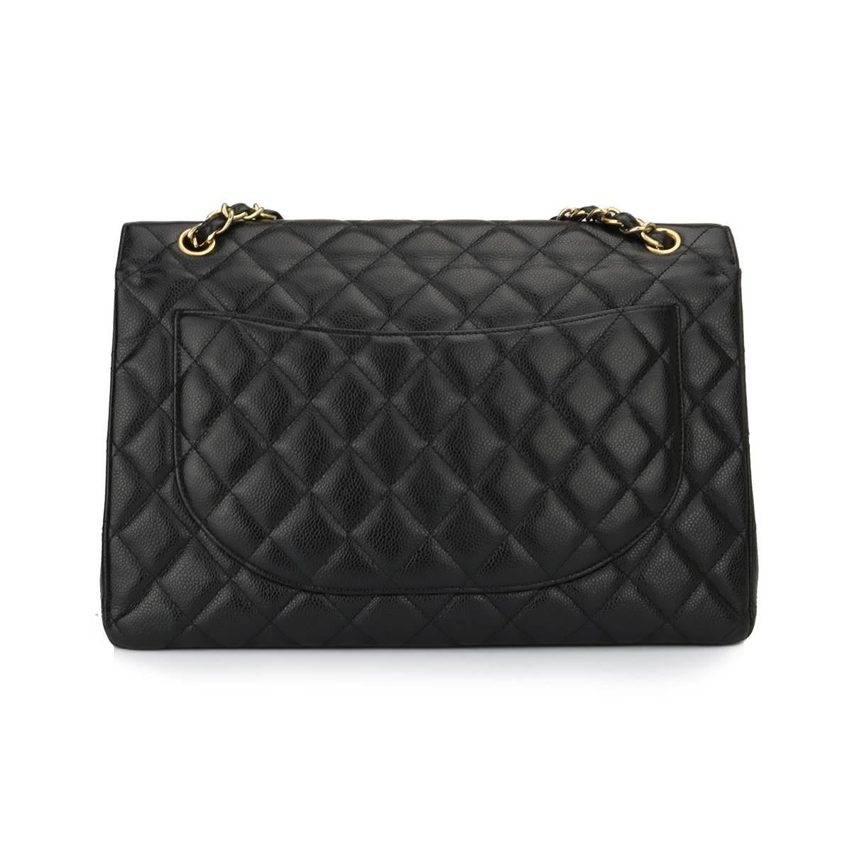 Authentic CHANEL Black Caviar Maxi Double Flap with Gold Hardware 2012.

This stunning bag is in an excellent condition, the bag still holds its shape quite well and the hardware is still very shiny, a brand new CC clasp has been replaced by