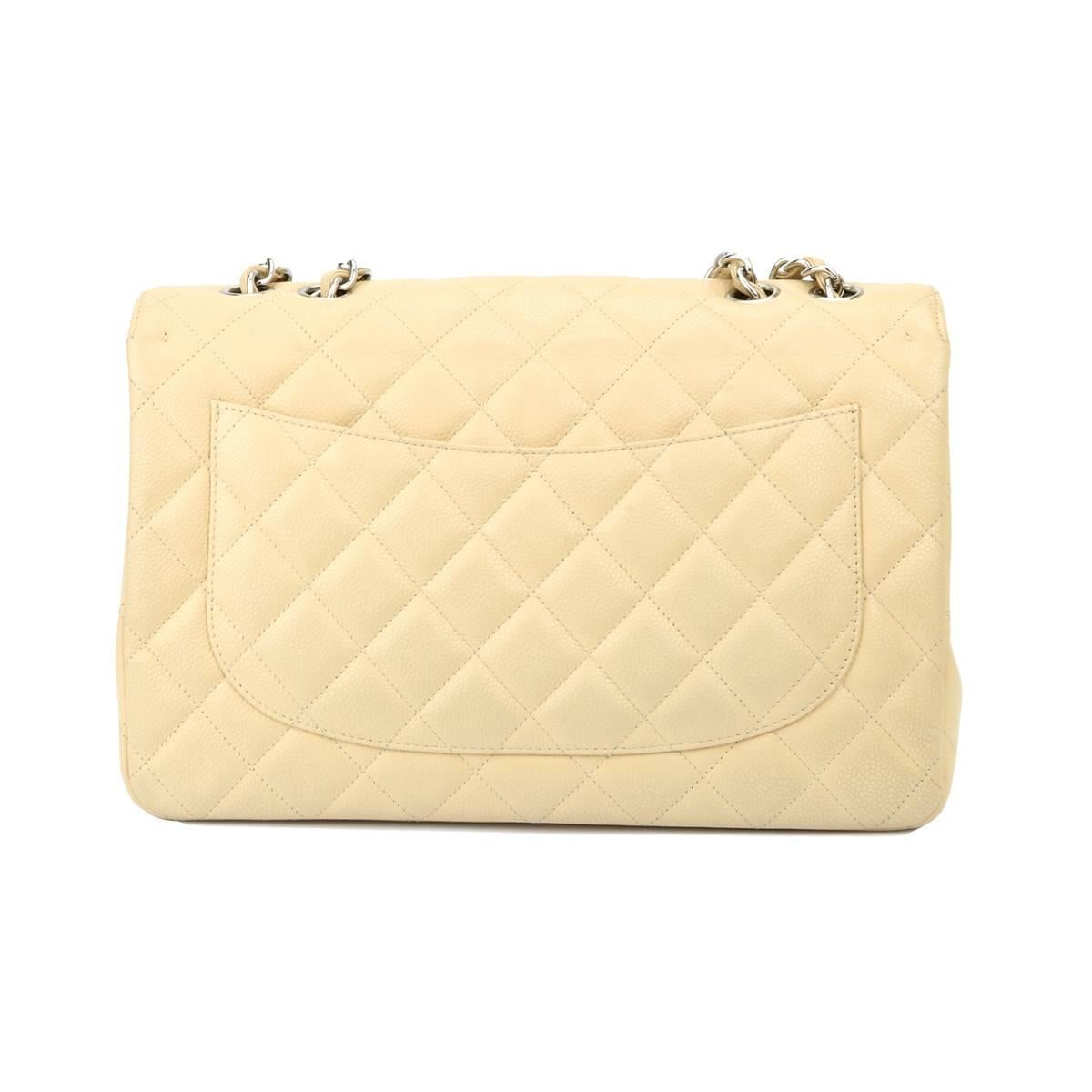 Authentic CHANEL Classic Single Flap Jumbo Beige Clair Caviar with Silver Hardware 2009.

This stunning bag is in an excellent condition. The bag still holds the original shape and the hardware is still very shiny.

Exterior Condition: excellent