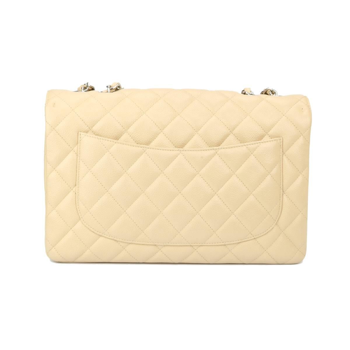 Authentic CHANEL Classic Single Flap Jumbo Beige Clair Caviar with Silver Hardware 2009.

This stunning bag is in a mint condition. The bag still holds the original shape and the hardware is still very shiny.

Exterior Condition: mint condition,