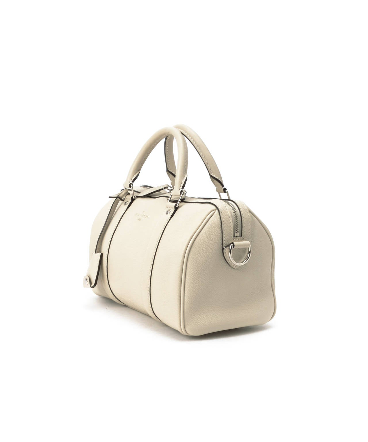 White Veau Cachemire leather 
Due to its vintage nature, there are faint stains on the corners The shoulder strap's drop length is approximately 47 cm 
Comes with original lock, keys, clochette, dust bag and strap 
The measurements of the items