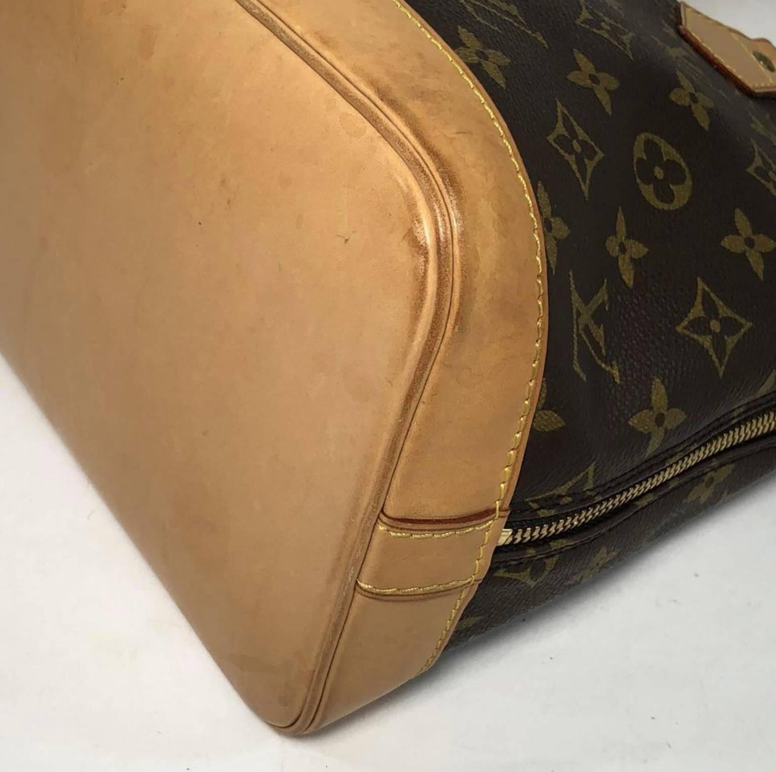 Women's or Men's Louis Vuitton Monogram Alma PM Satchel Bag For Sale