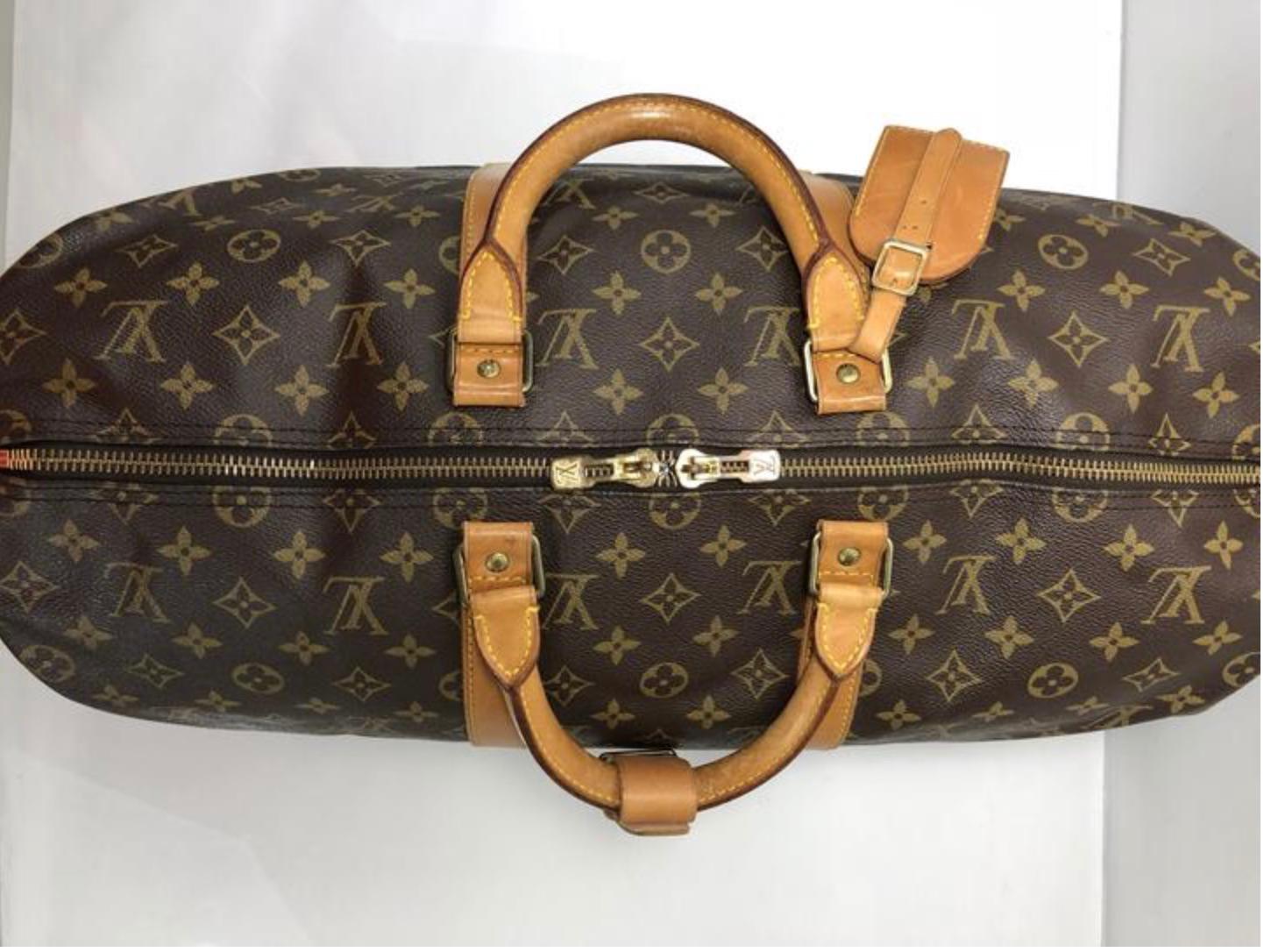 Women's or Men's Louis Vuitton Monogram Keepall Bandoliere 50 Travel Handbag For Sale