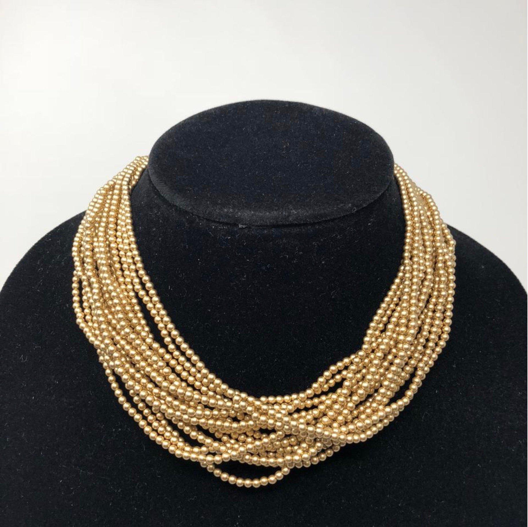 MODEL - Carolee Multistrand Mini Round Gold Choker Necklace 

CONDITION - Exceptional! No signs of wear.

SKU - 2345-FL

ORIGINAL RETAIL PRICE - 275 + tax

MATERIAL - Mixed Metal with Gold Plating

WEIGHT - NA

DIMENSIONS - 16 inch

COMES WITH - No
