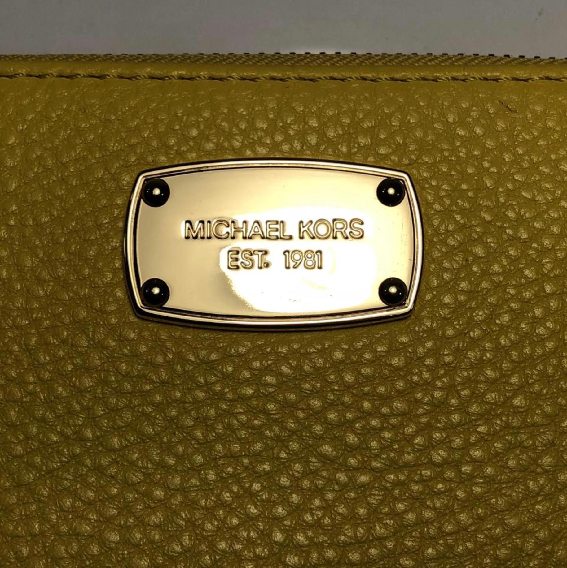 MODEL - Michael Kors Leather Long Zipper Wallet in Yellow

CONDITION - NEW!

SKU - 102-TF

ORIGINAL RETAIL PRICE - 150 + tax

DATE/SERIAL CODE - NA

PRODUCTION - Approximately 2010 onward

DIMENSIONS - L8 x H4 x D1

STRAP/HANDLE DROP - NA

MATERIAL