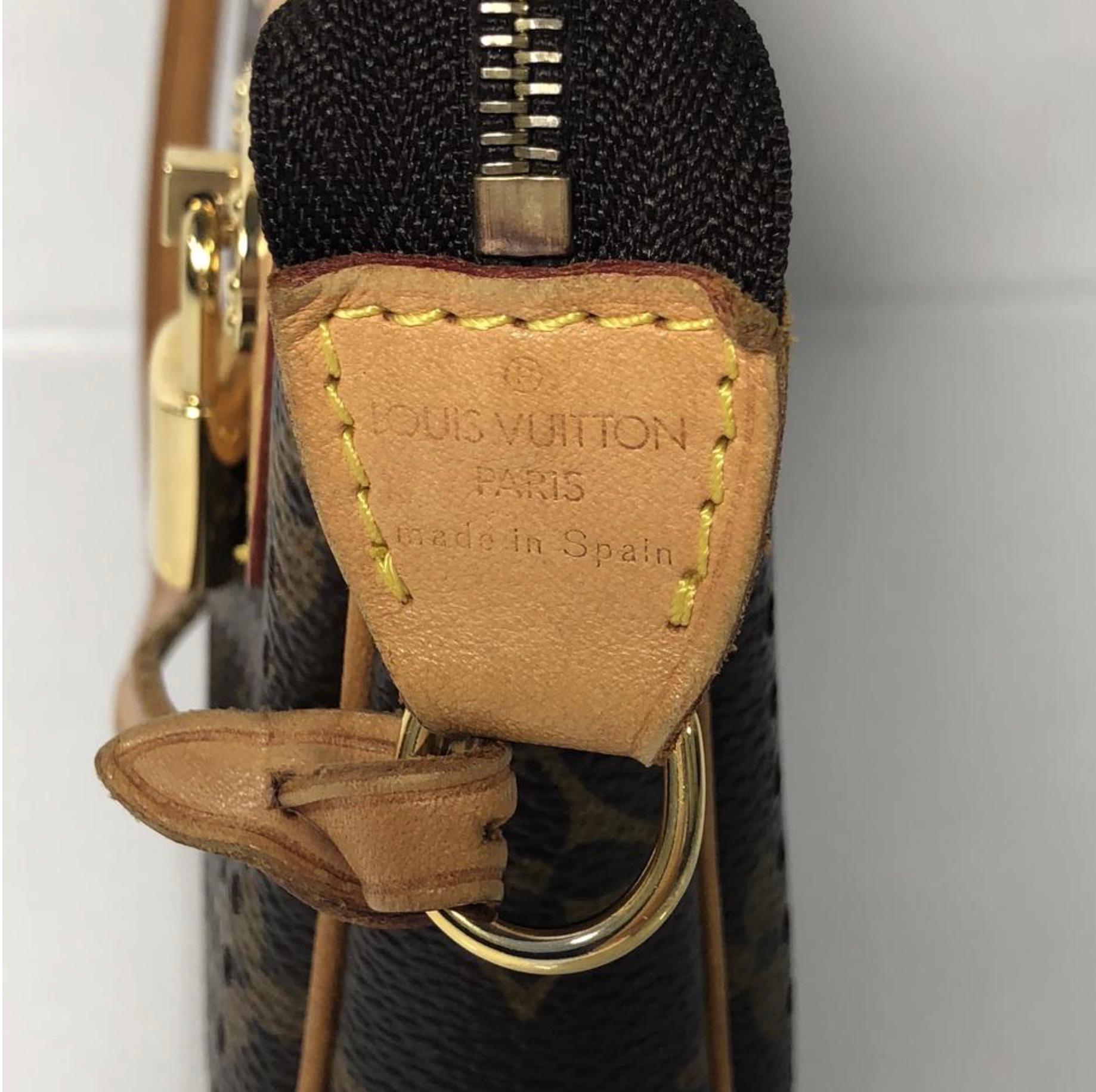 Louis Vuitton Monogram Perforated Pochette Accessories Wristlet In Excellent Condition For Sale In Saint Charles, IL