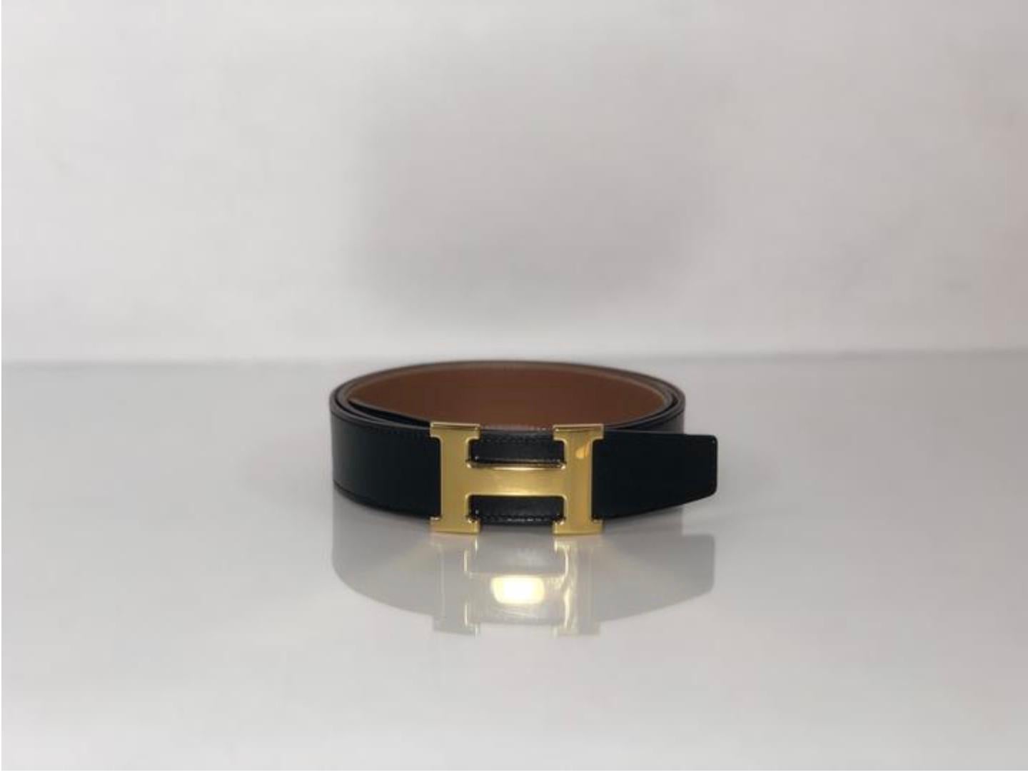 MODEL - Hermes Reversible Black and Brown H Belt with Polished Gold H Buckle 85cm

CONDITION - Exceptional! Light Feather Scuffing on Belt Buckle.

SKU - 2761

ORIGINAL RETAIL PRICE - 1000 + tax

DATE/SERIAL CODE - 85cm CAA 020 ZA

ORIGIN -