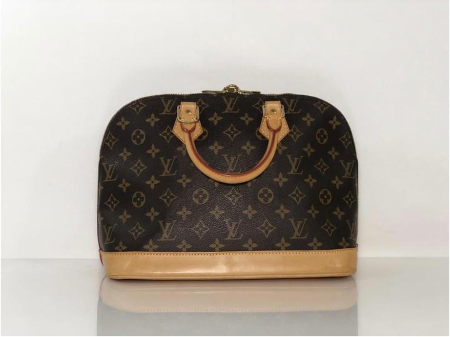 Women's or Men's Louis Vuitton Monogram Alma PM Satchel Handbag For Sale