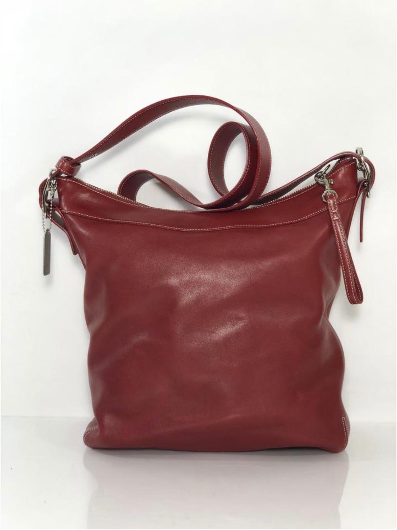 MODEL - Coach Vintage Large Slim Legacy Crossbody Shoulder Handbag in Deep Red

CONDITION - Exceptional! Very very light scuffing.

SKU - AIS-KUTA-12

ORIGINAL/CURRENT RETAIL PRICE - 495 + tax

DATE/SERIAL CODE - D3S-9188

DIMENSIONS - L11 x H12 x