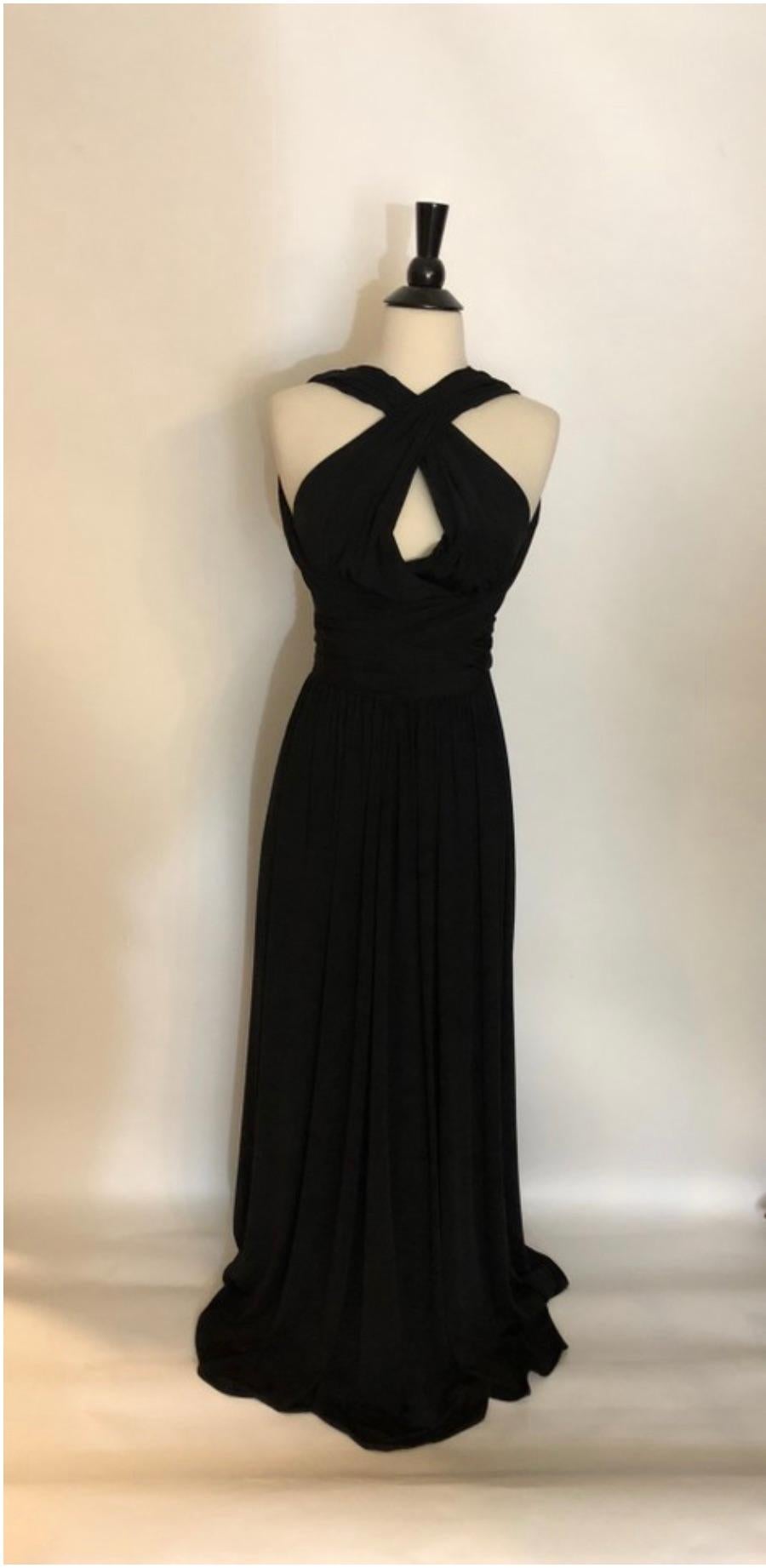 MODEL - Halston Heritage Cutout Knotted Stretch-Jersey Gown in Black

CONDITION - Looks NEW. No signs of wear!

SKU - 2202.1

ORIGINAL/CURRENT RETAIL PRICE - 495 + tax

SIZE - 2

MATERIAL - Polyester and Spandex

COLOR - Black

MODEL DETAILS - Full