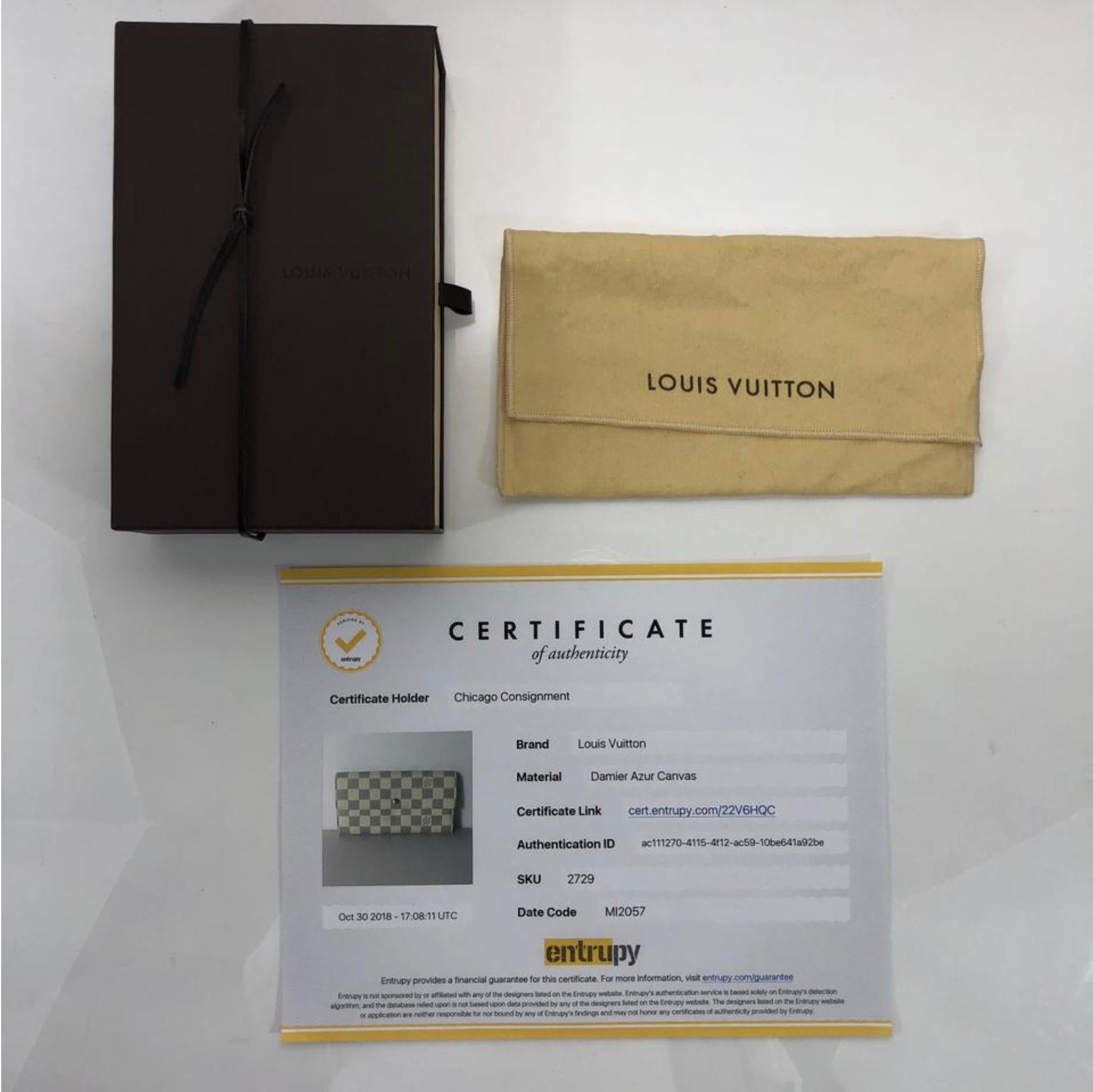 MODEL - Louis Vuitton Damier Azur Sarah Wallet

CONDITION - Exceptional! No watermarks, no handle darkening, no dryness. Bright and shiny hardware with no tarnishing. Hawaii heat stamp on interior. No rips, holes, tears, or odors. Light smudging on