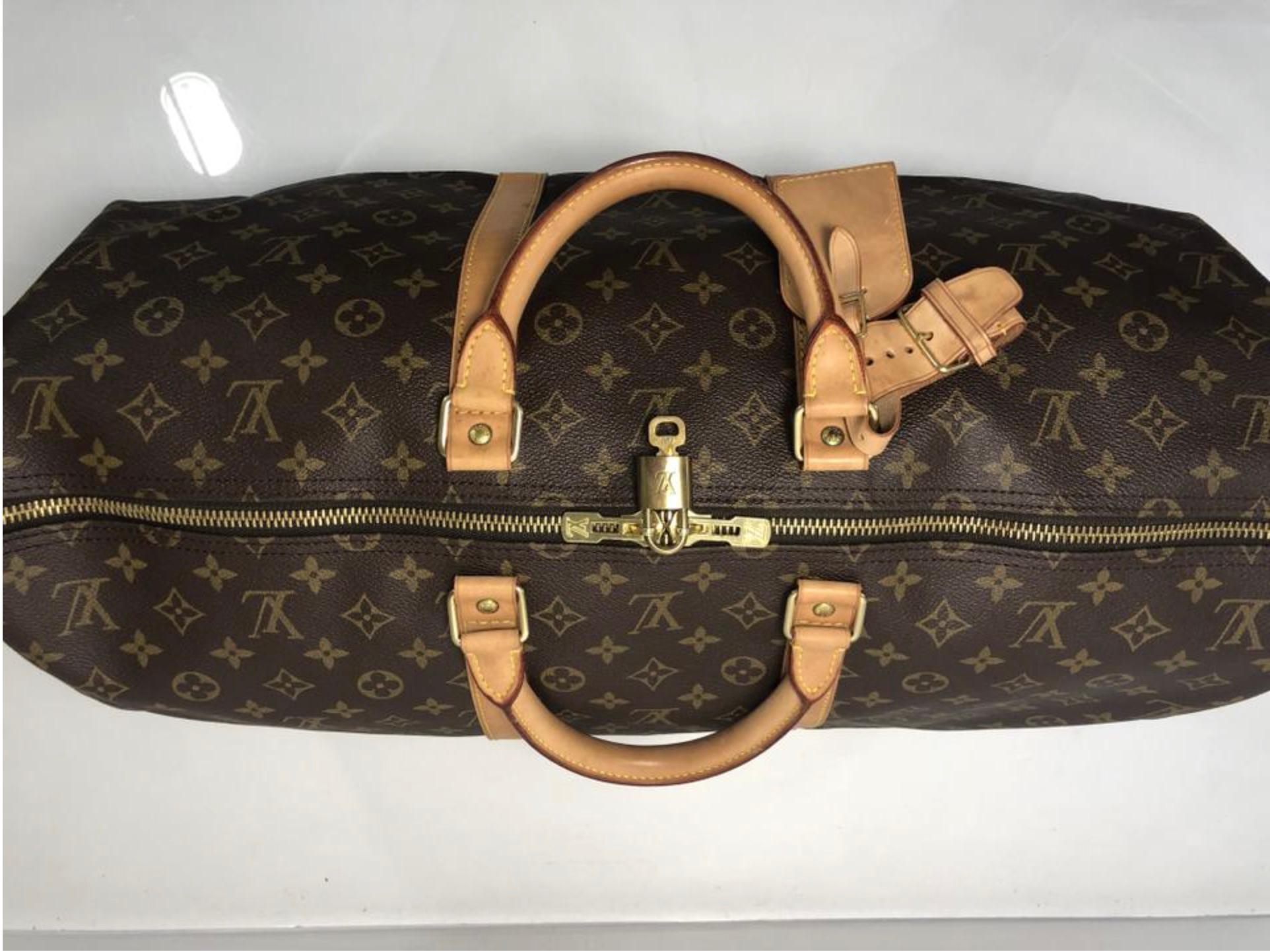  Louis Vuitton Monogram Keepall 55 Travel Top Handle Bag For Sale 2