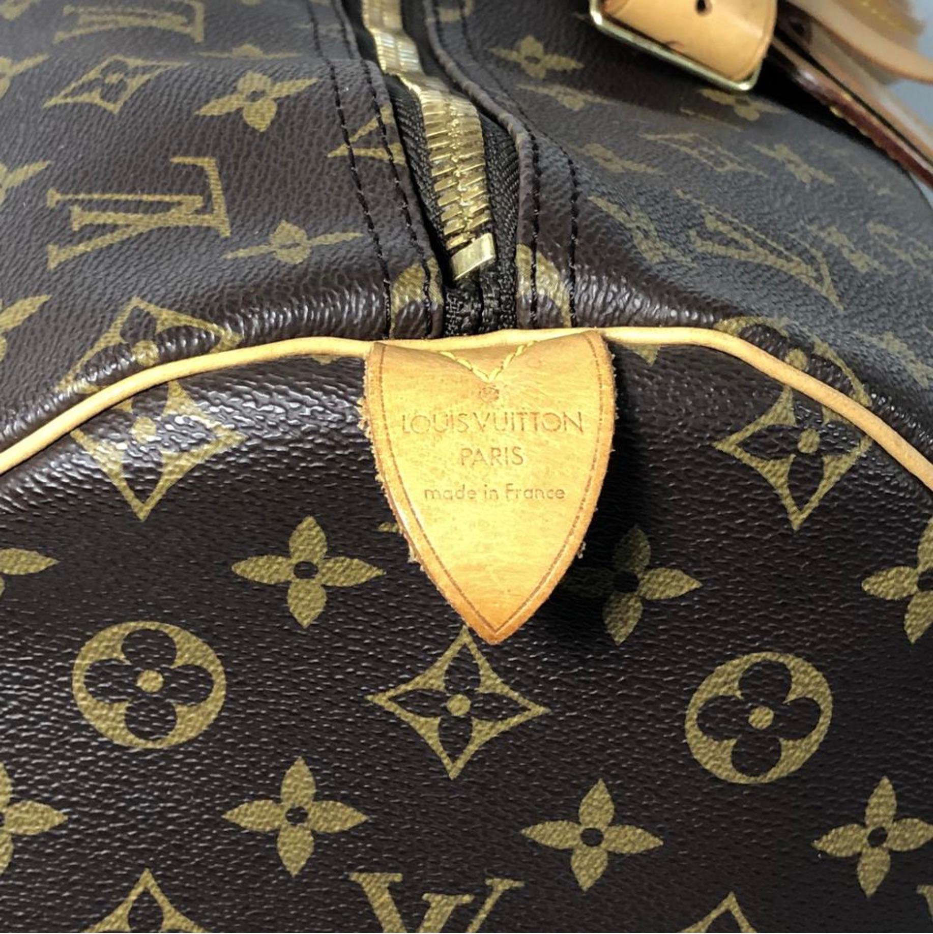 Women's or Men's  Louis Vuitton Monogram Keepall 55 Top Handle Travel Bag For Sale