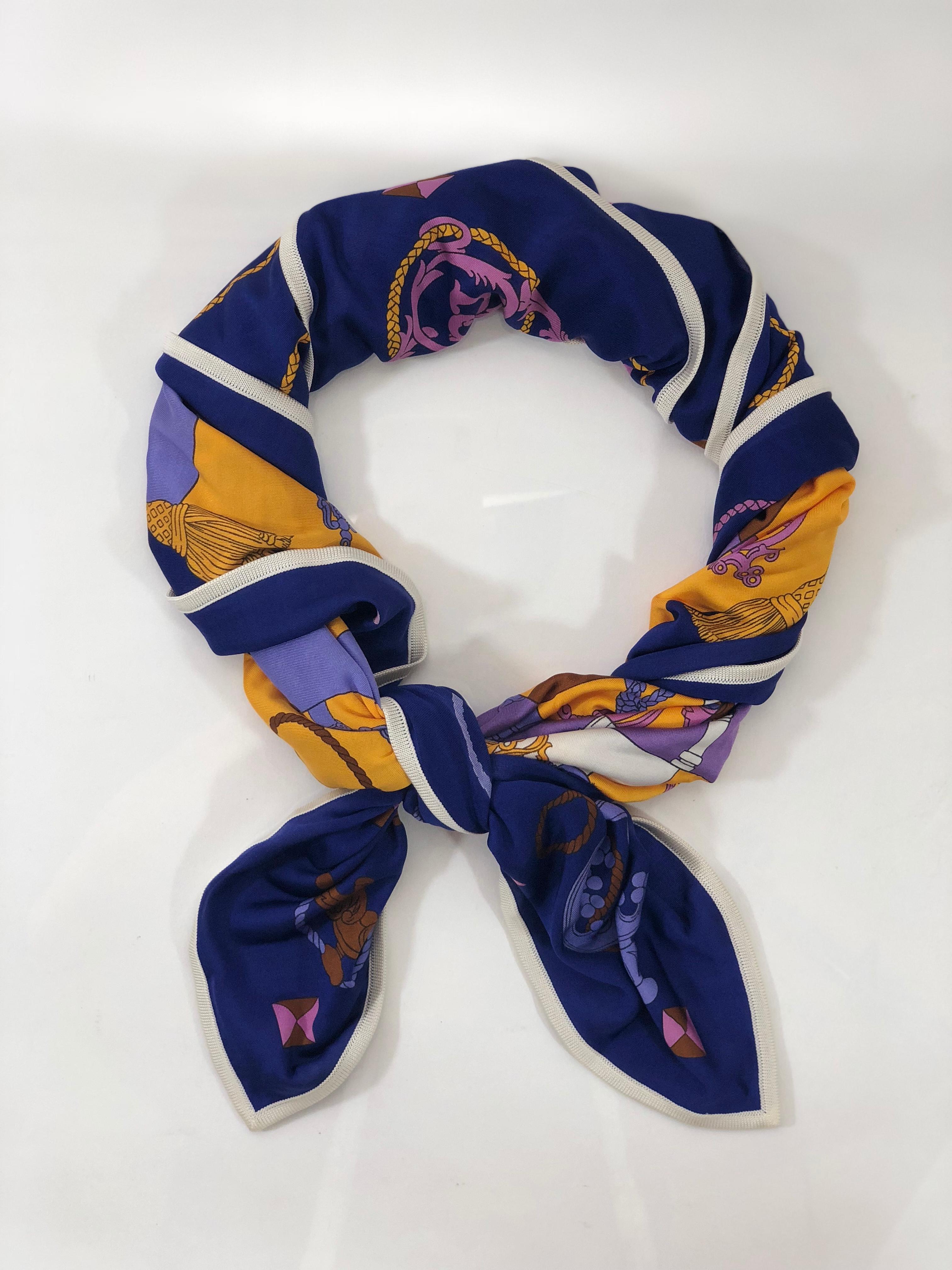MODEL - Hermes 100% Silk Jersey Knit Scarf Tours De Cles in Purple.

CONDITION - Exceptional. No signs of wear.

SKU - 2331

ORIGINAL RETAIL PRICE - 895 + tax

ORIGIN - France

DIMENSIONS - L39 x H35.5 x D.02

MATERIAL - Silk 

COMES WITH - Original