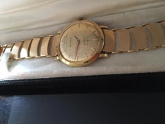 A gentleman's 1950's Movado, 14 karat yellow Gold automatic bracelet wristwatch
