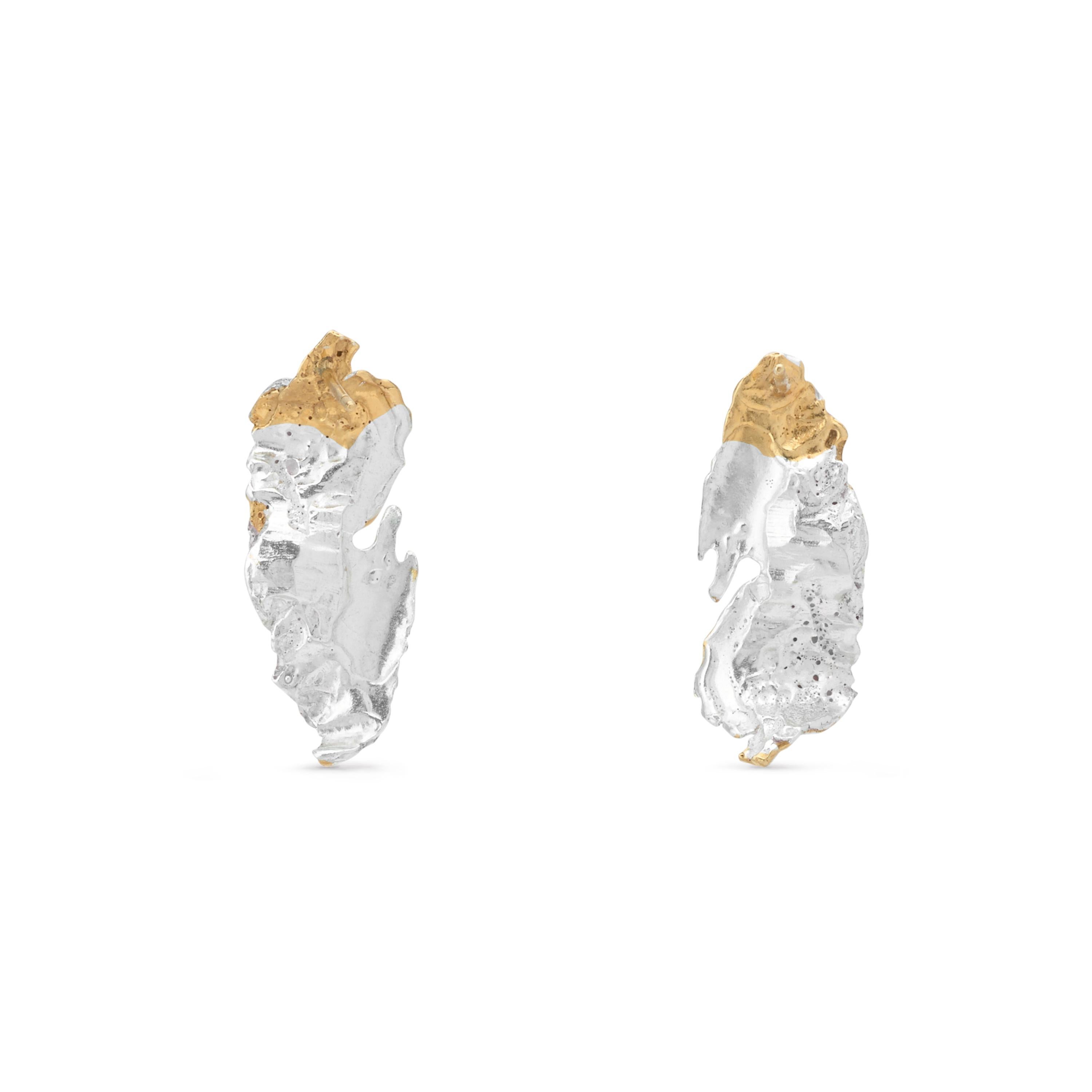 Anani is a biblical name meaning ‘cloud’. The ethereal, rounded shapes of these beautiful earrings reflect the amorphous, random figures that clouds take on as they form, just as their muted gold and silver hues are reminiscent of the combination of