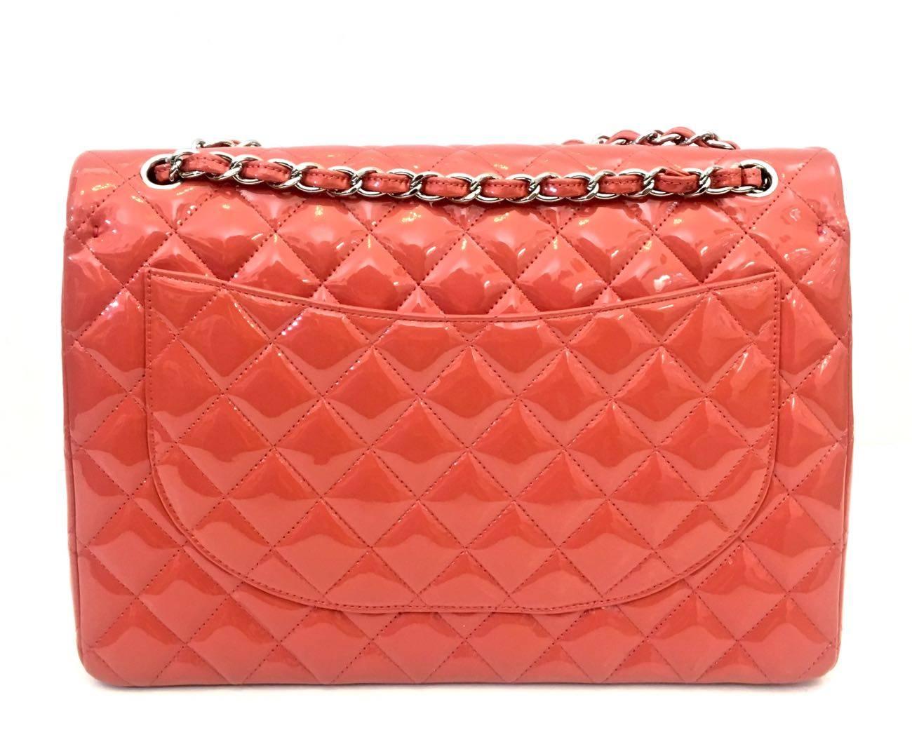 Chanel Bag Maxi Jumbo Coral Vernis Leather 
Hdw Silver. Year 2011- 2012. Double flap bag in timeless. Rear exterior slot pocket. 
Dimensions 32.0 x 22.0 x 10.0 cm. Signature interior pockets. Stamp inside the bag. Serial number on interior corner.